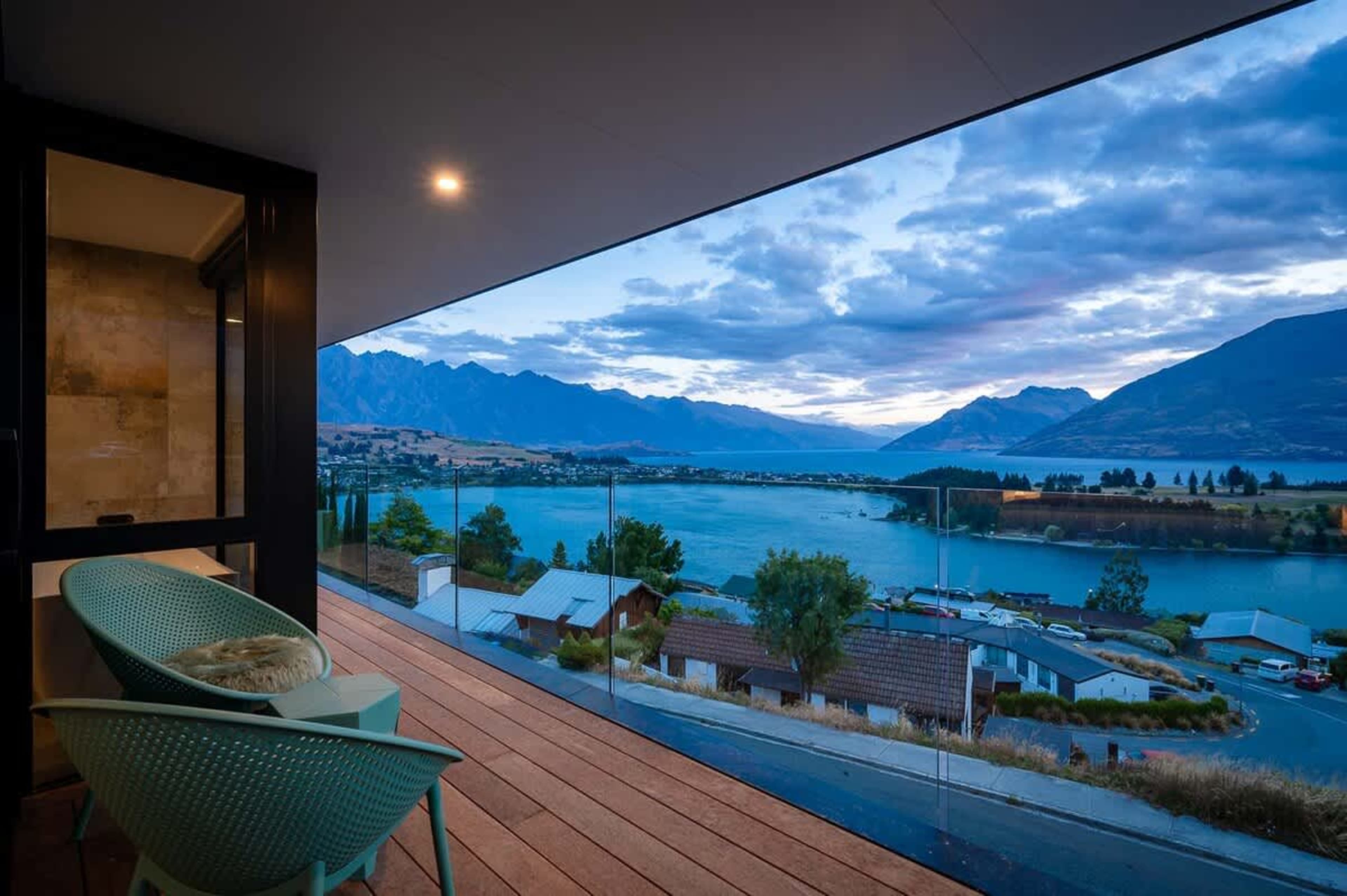Master Bedroom with Private Patio and Stunning Views
Step out from the master bedroom onto your private patio, offering a serene space to relax and enjoy breathtaking views of Lake Wakatipu and the surrounding mountains.