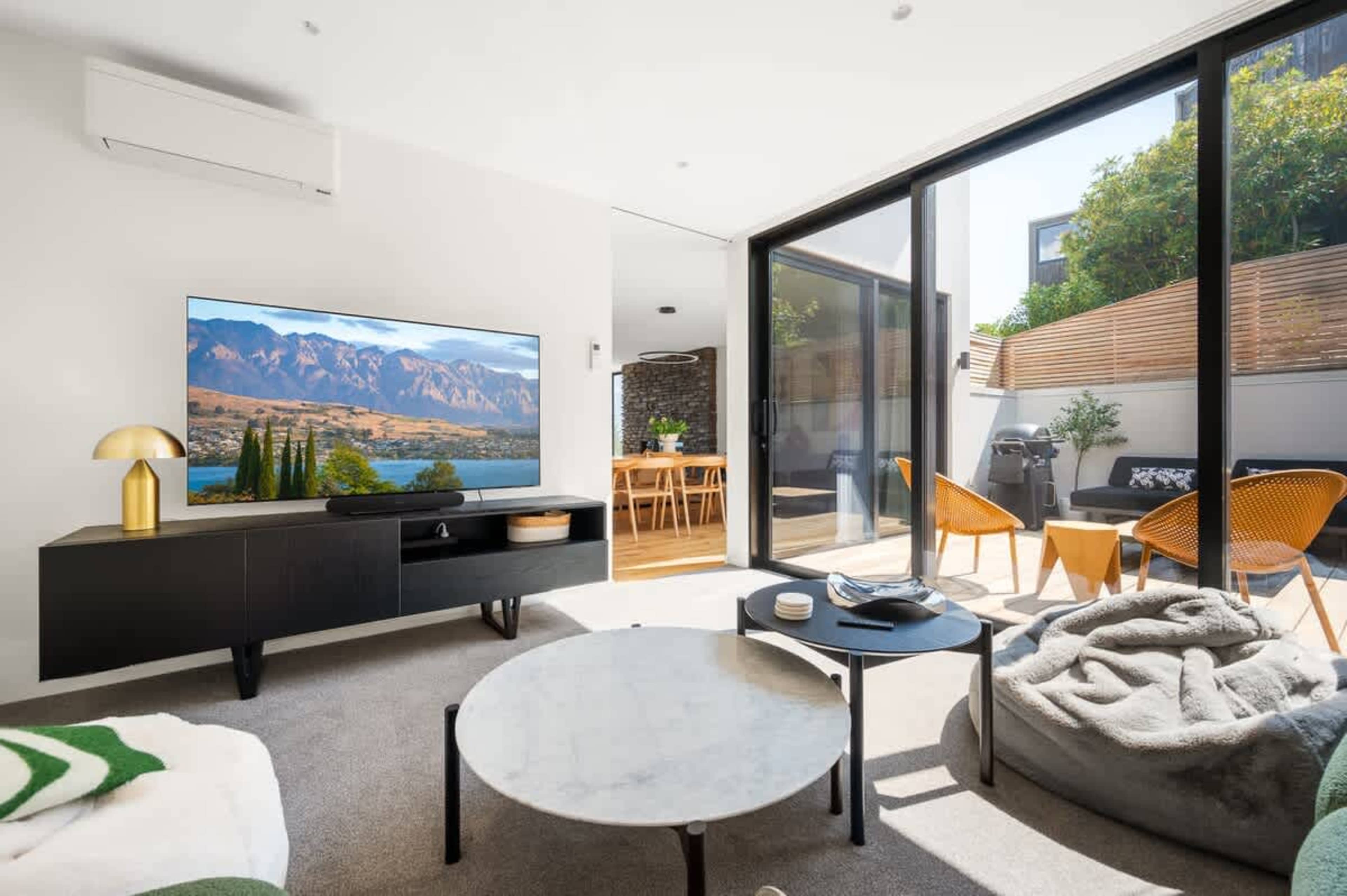 Second Living Room with 70-inch TV and Soundbar
The spacious second living room is perfect for entertainment, featuring a large 70-inch TV and a soundbar for an immersive viewing experience.