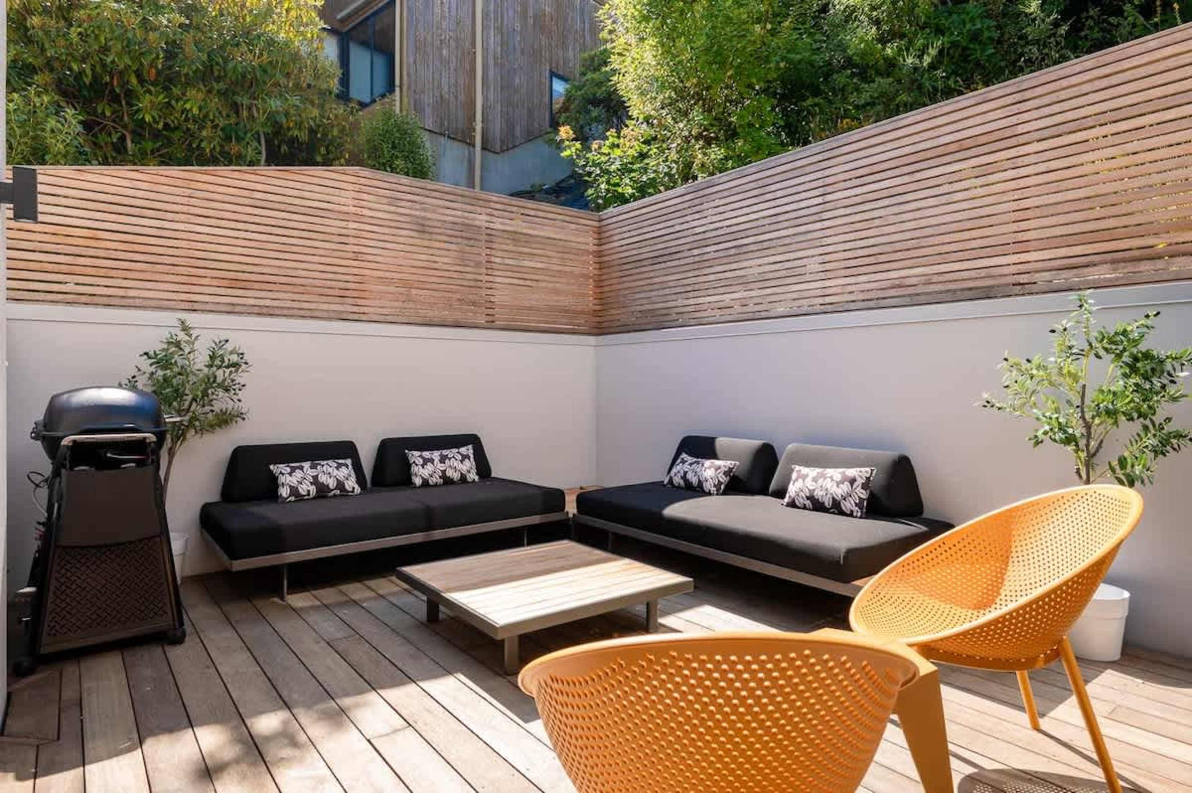 Protected Second Patio for Calm, Wind-Free Moments
The second patio offers a sheltered area, ideal for enjoying the outdoors on windy days without sacrificing comfort.
