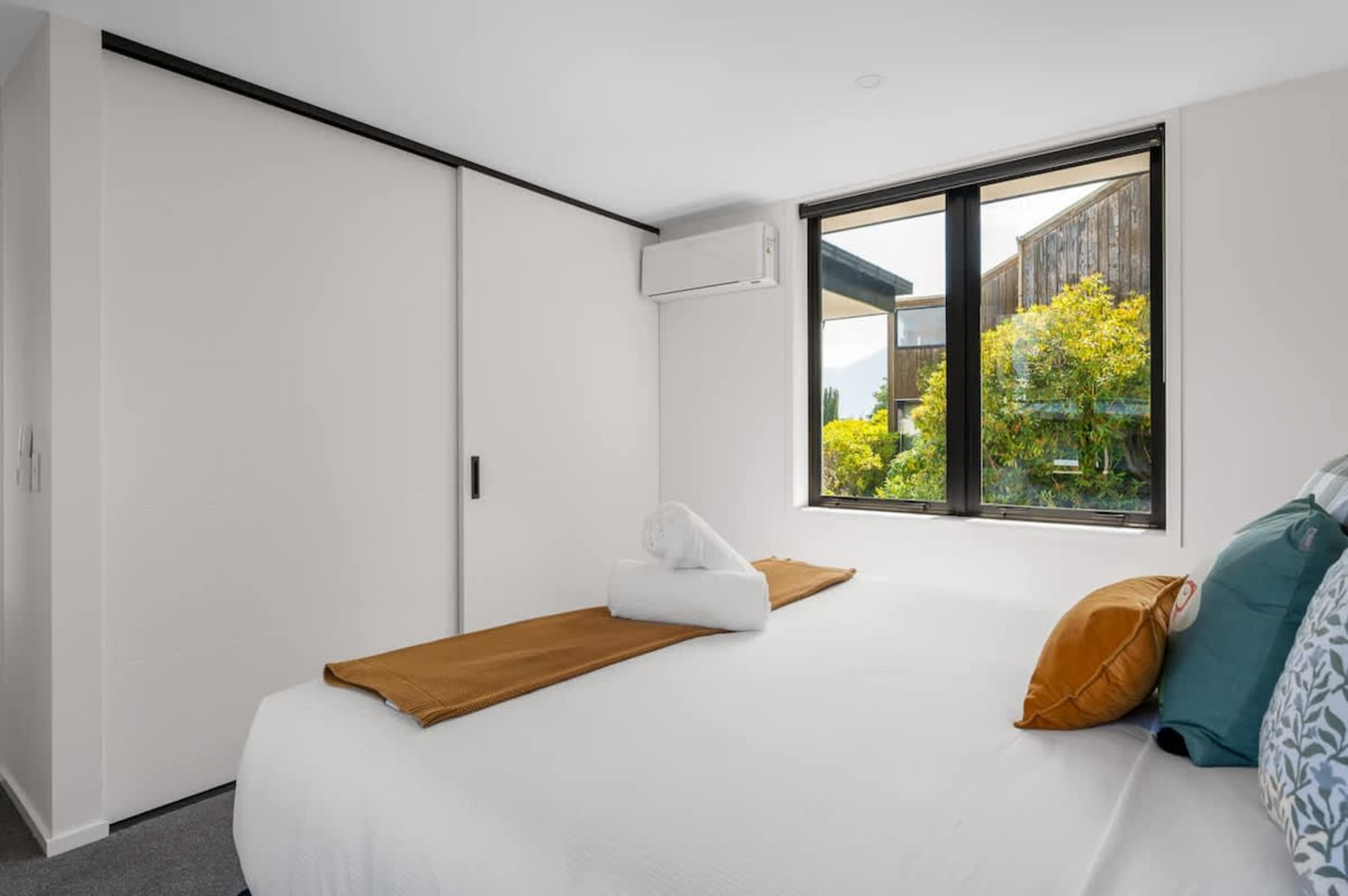Spacious Fourth Bedroom with King Split and Storage
With a king split bed and plenty of storage, the fourth bedroom offers both convenience and comfort for a restful experience.