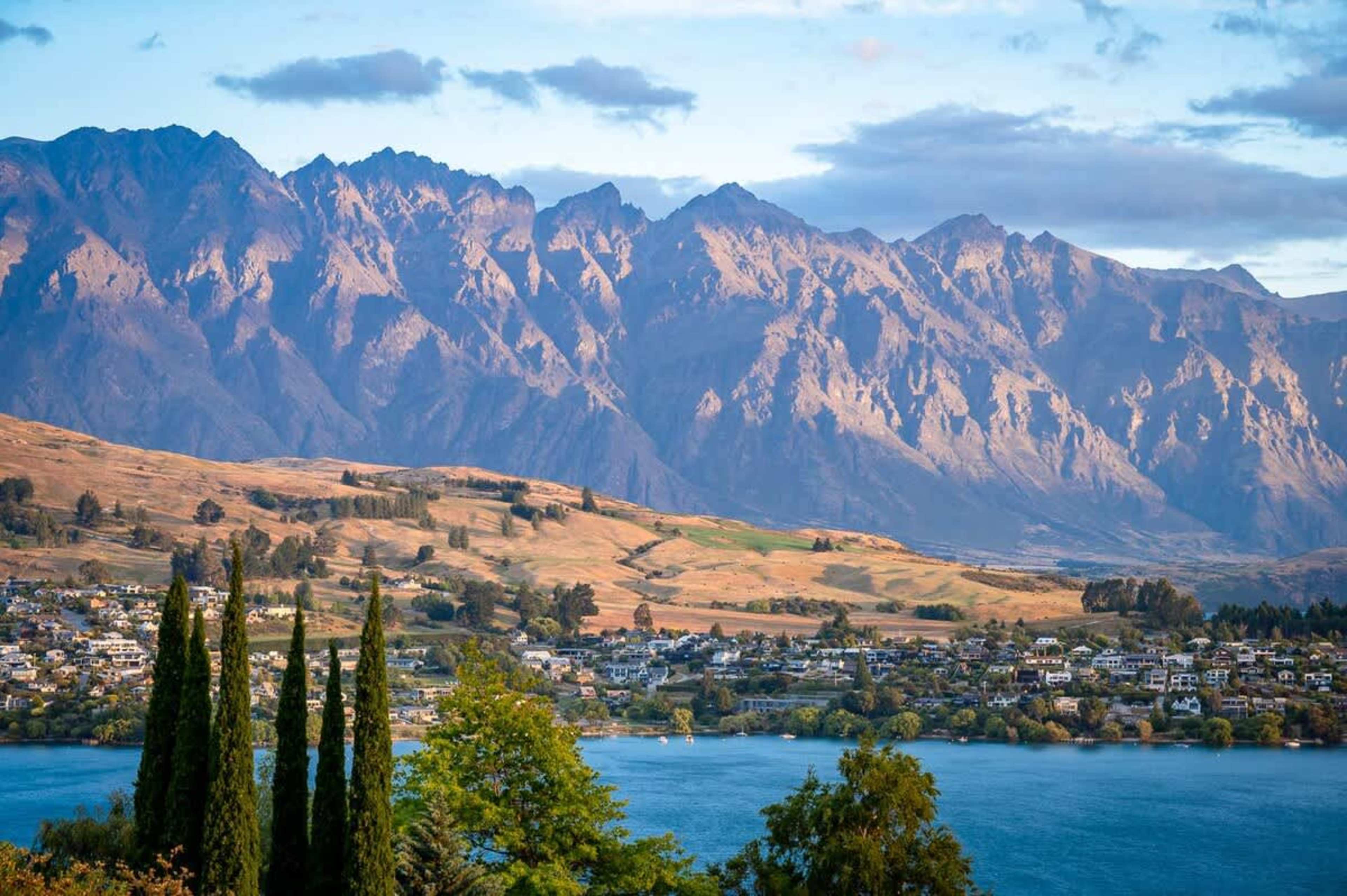 Outdoor Living with Lake Wakatipu Views
Capture the villa’s outdoor areas with BBQ and seating, perfect for enjoying lake views in a tranquil Queenstown setting.