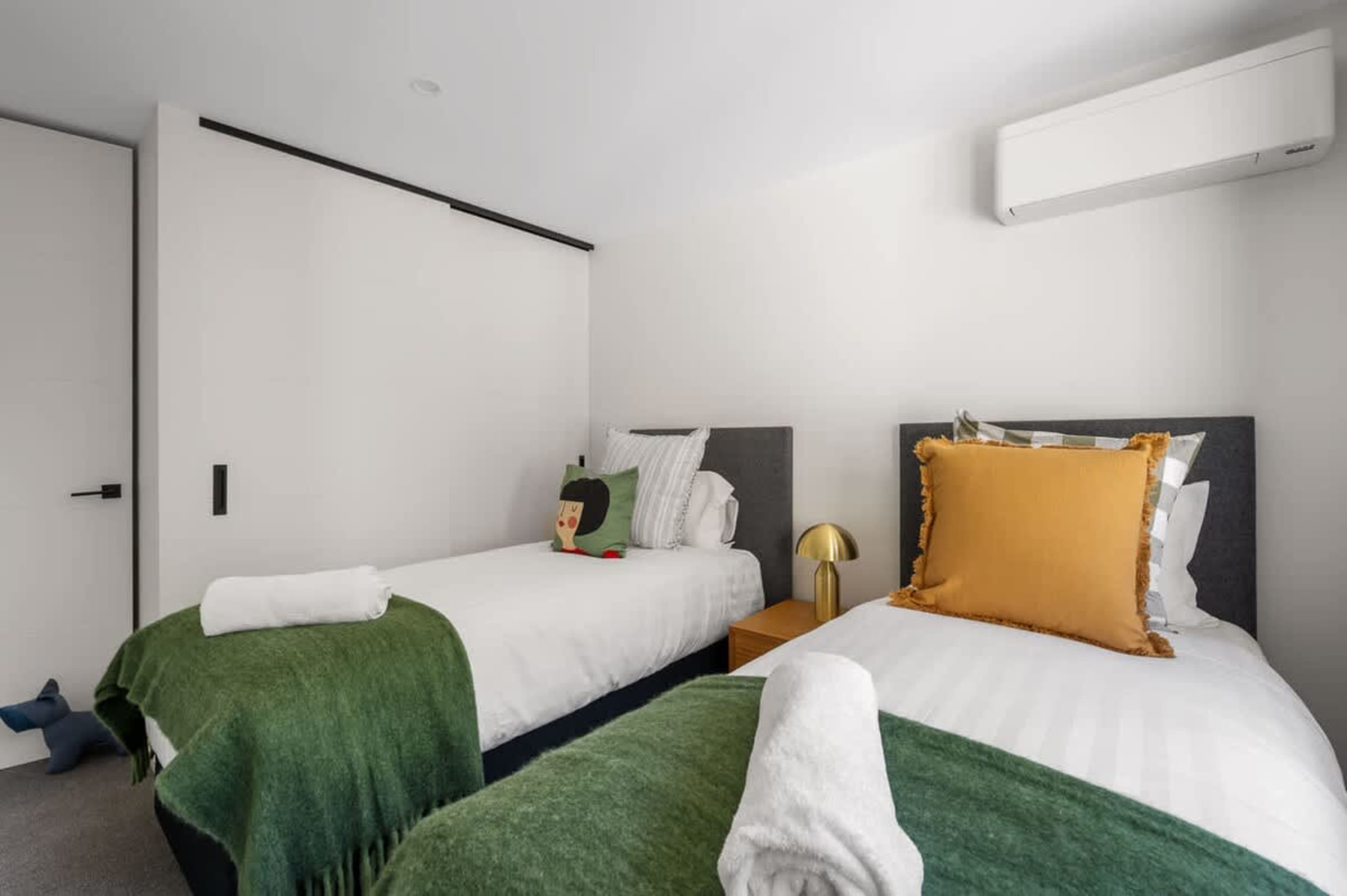 Family-Friendly Third Bedroom with a King Bed that can be converted into Single Beds
With two single beds, the third bedroom provides a cozy and practical space for families, ensuring a comfortable and enjoyable experience.