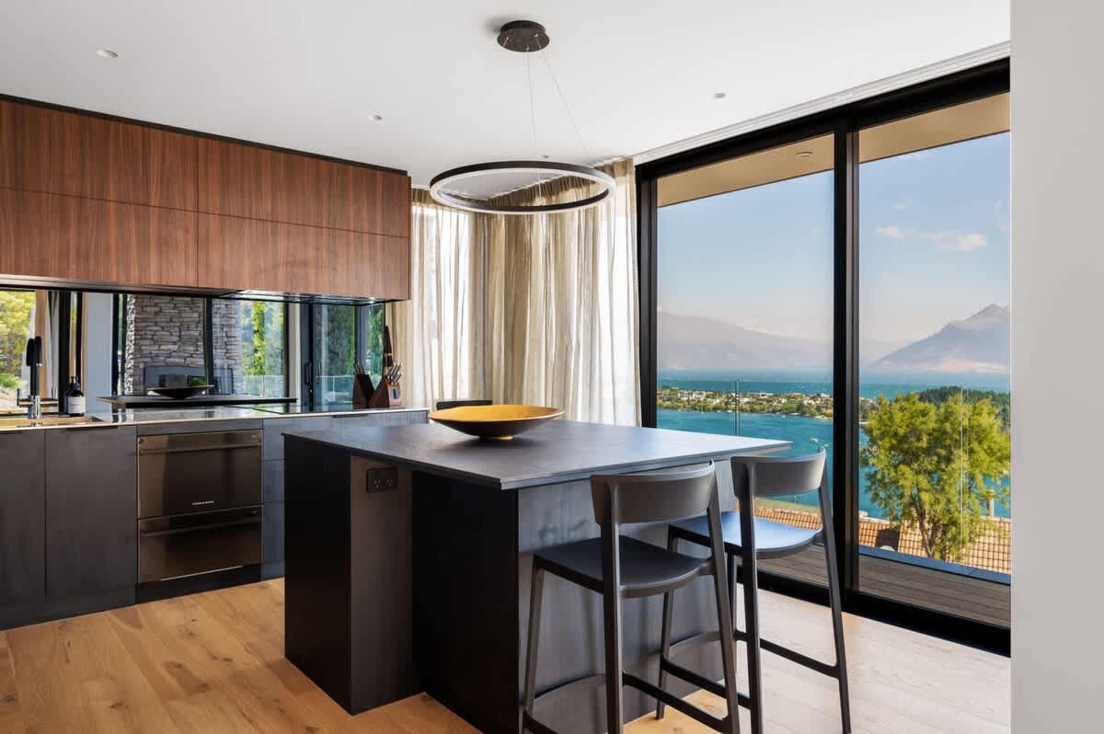 Modern Kitchen with Premium Appliances
The fully equipped kitchen features top-of-the-line appliances, providing everything you need to create gourmet meals during your stay.