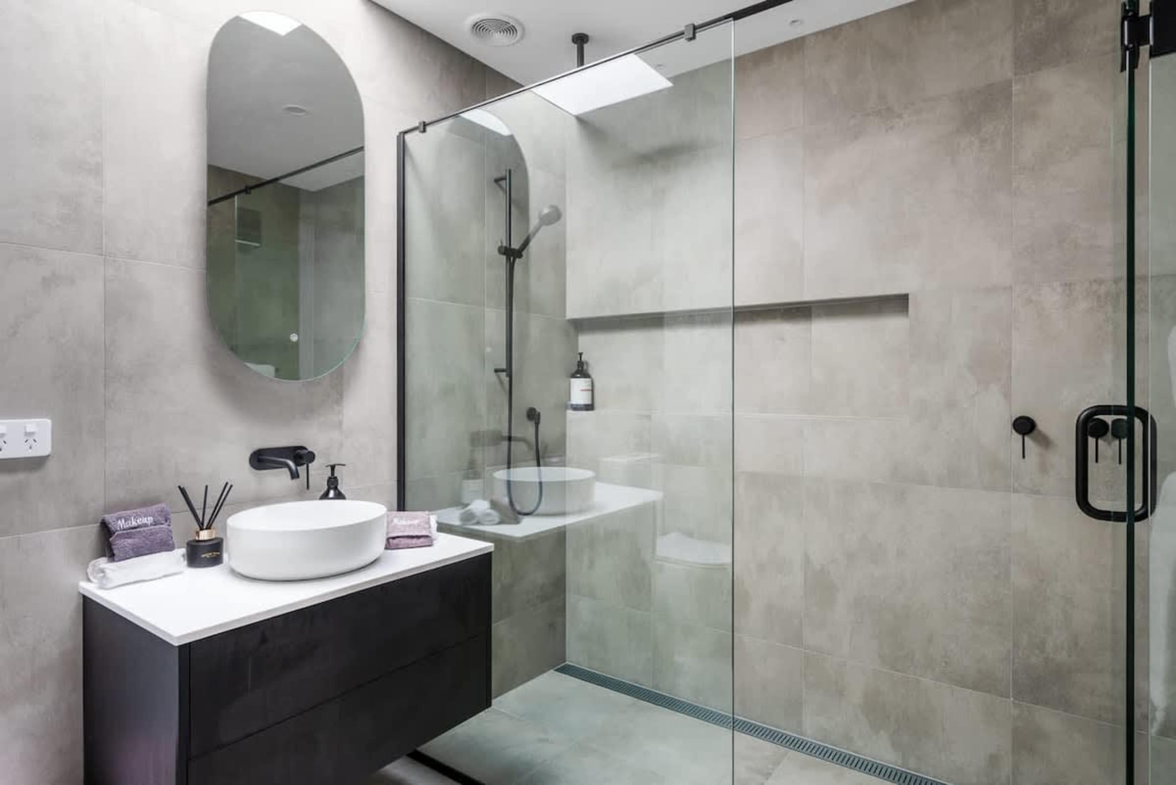 Main Bathroom with Luxury Finishes
The main bathroom features elegant design and premium finishes, offering a spacious, comfortable space with all the essentials for your stay.