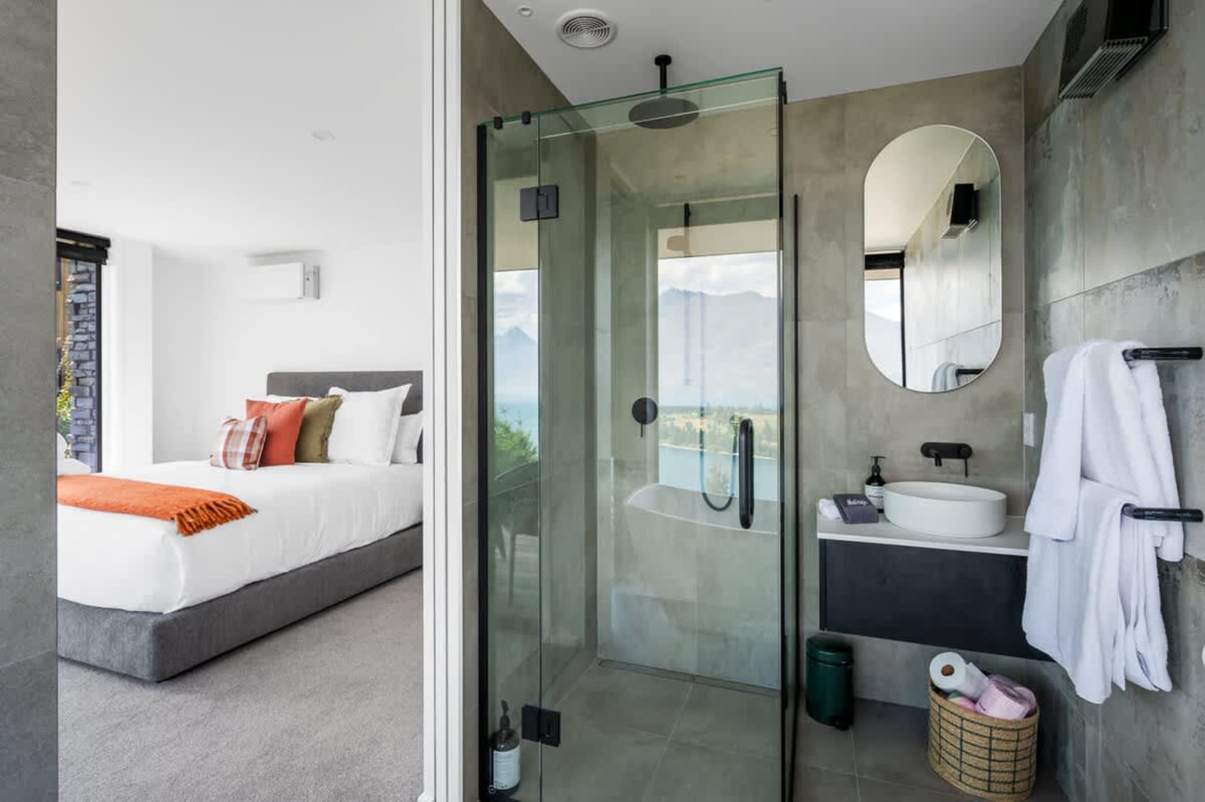 Master Ensuite with Heated Floors and Lake View Bath
The luxurious master ensuite features heated floors and a soaking tub with stunning views of Lake Wakatipu, complemented by premium Ashley & Co toiletries for the ultimate relaxation.