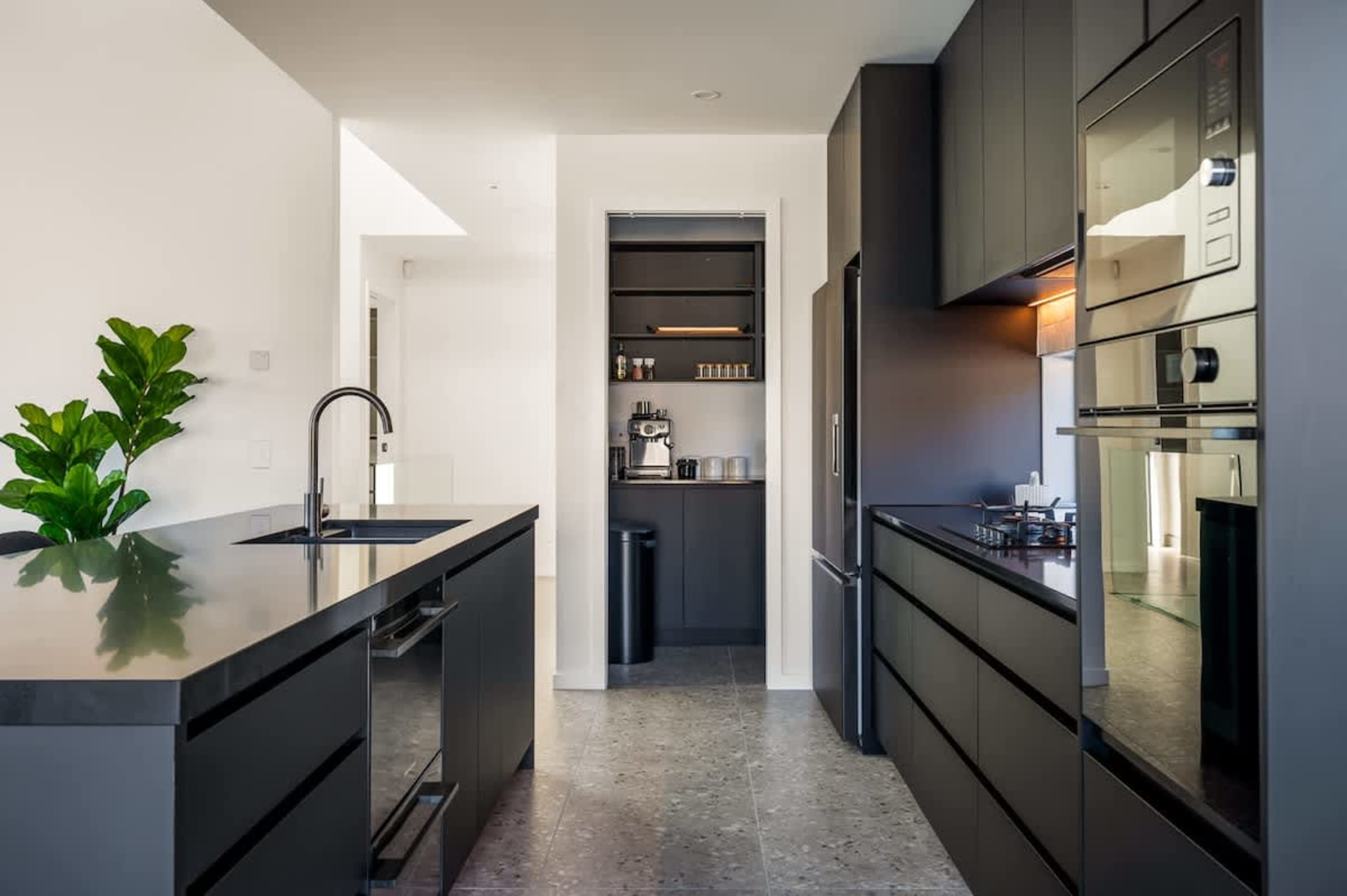 Modern Gourmet Kitchen – This brand-new kitchen is fully stocked with high-end appliances, cookware, and utensils, making it easy to prepare meals while enjoying breathtaking views of Queenstown’s mountains and lake.