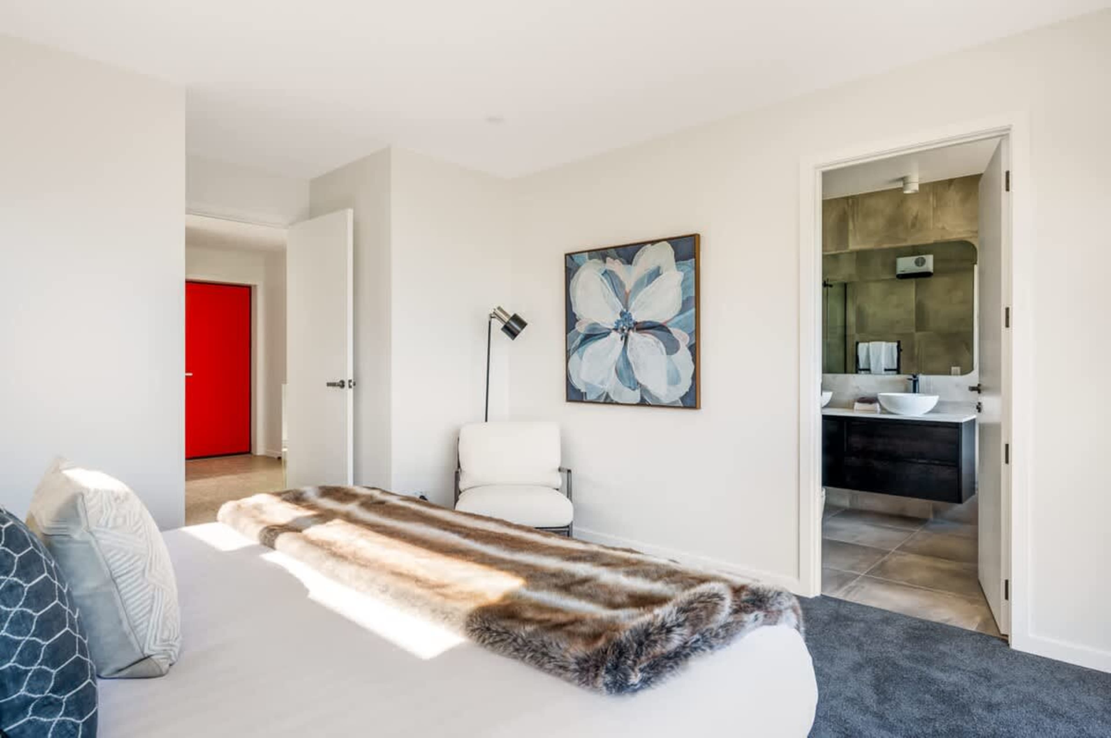Private Retreat with Style – The master bedroom is a serene escape, combining stunning views, a walk-in wardrobe, and a spa-like ensuite to create the perfect blend of comfort and sophistication.