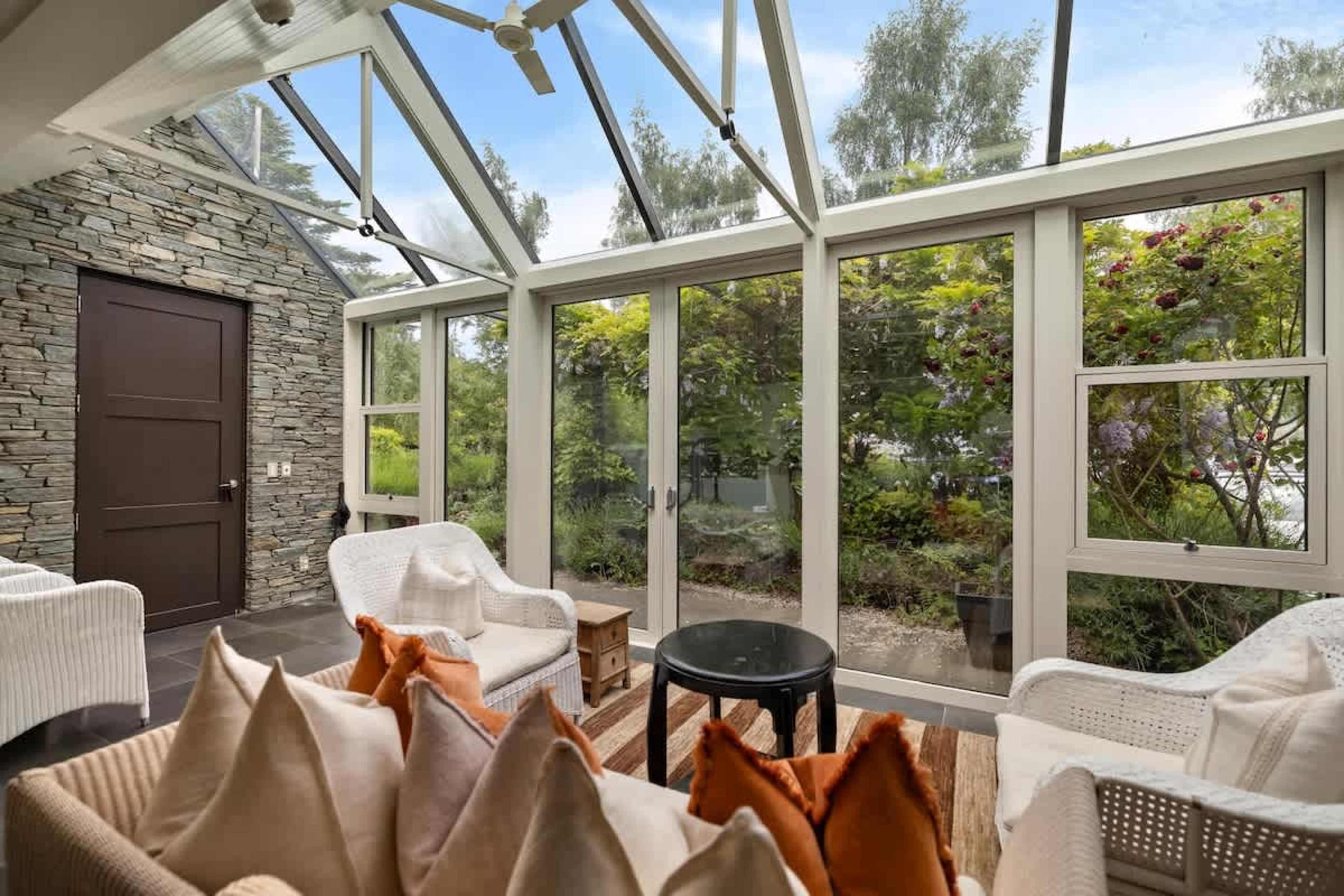 Soak in the Scenery – This beautiful conservatory provides uninterrupted views of Lake Wakatipu and the Remarkables, creating a peaceful and luxurious escape.