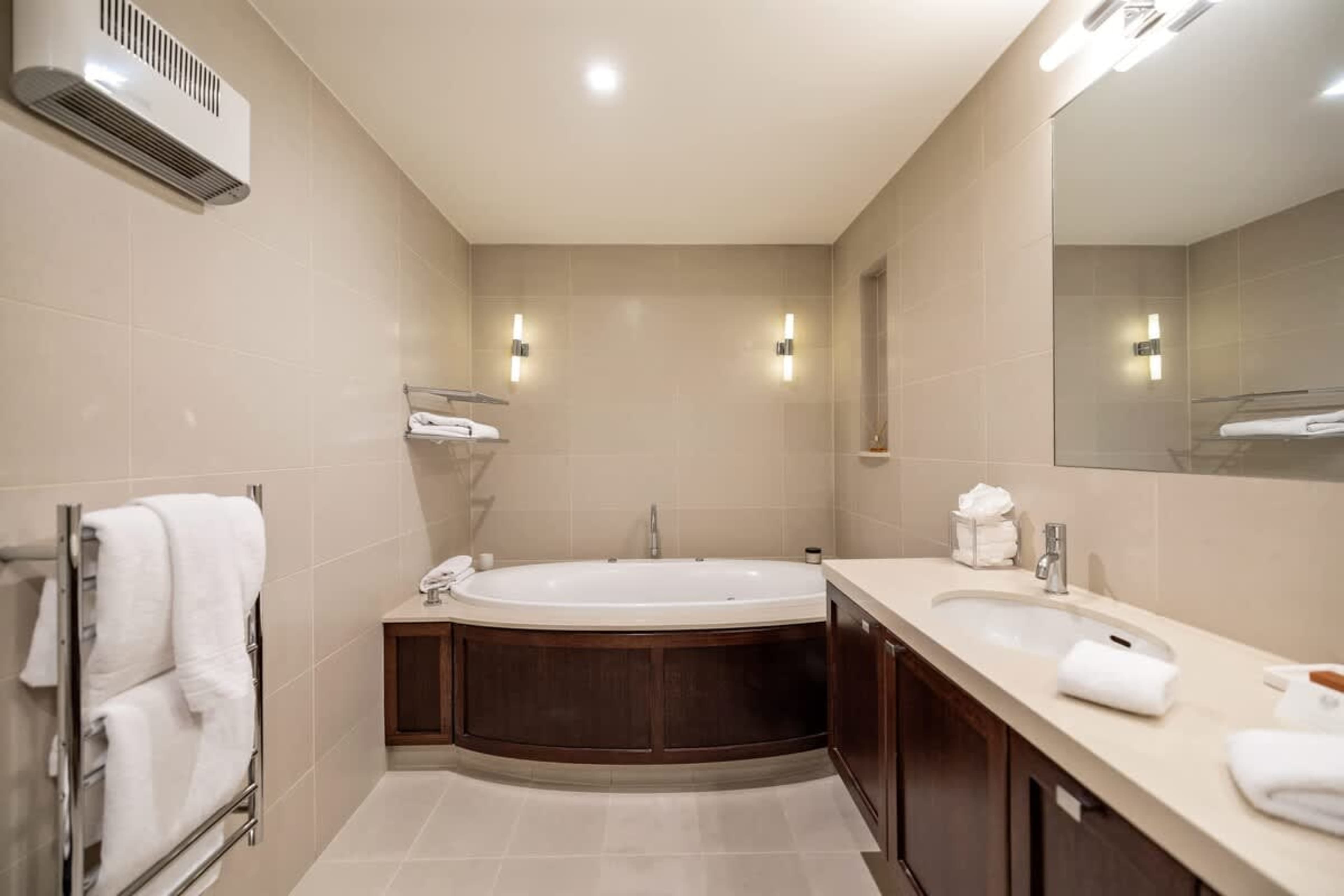 Spa-Like Luxury Ensuite – Indulge in premium amenities, plush bathrobes, hotel-grade towels, and slippers for a true five-star experience.
