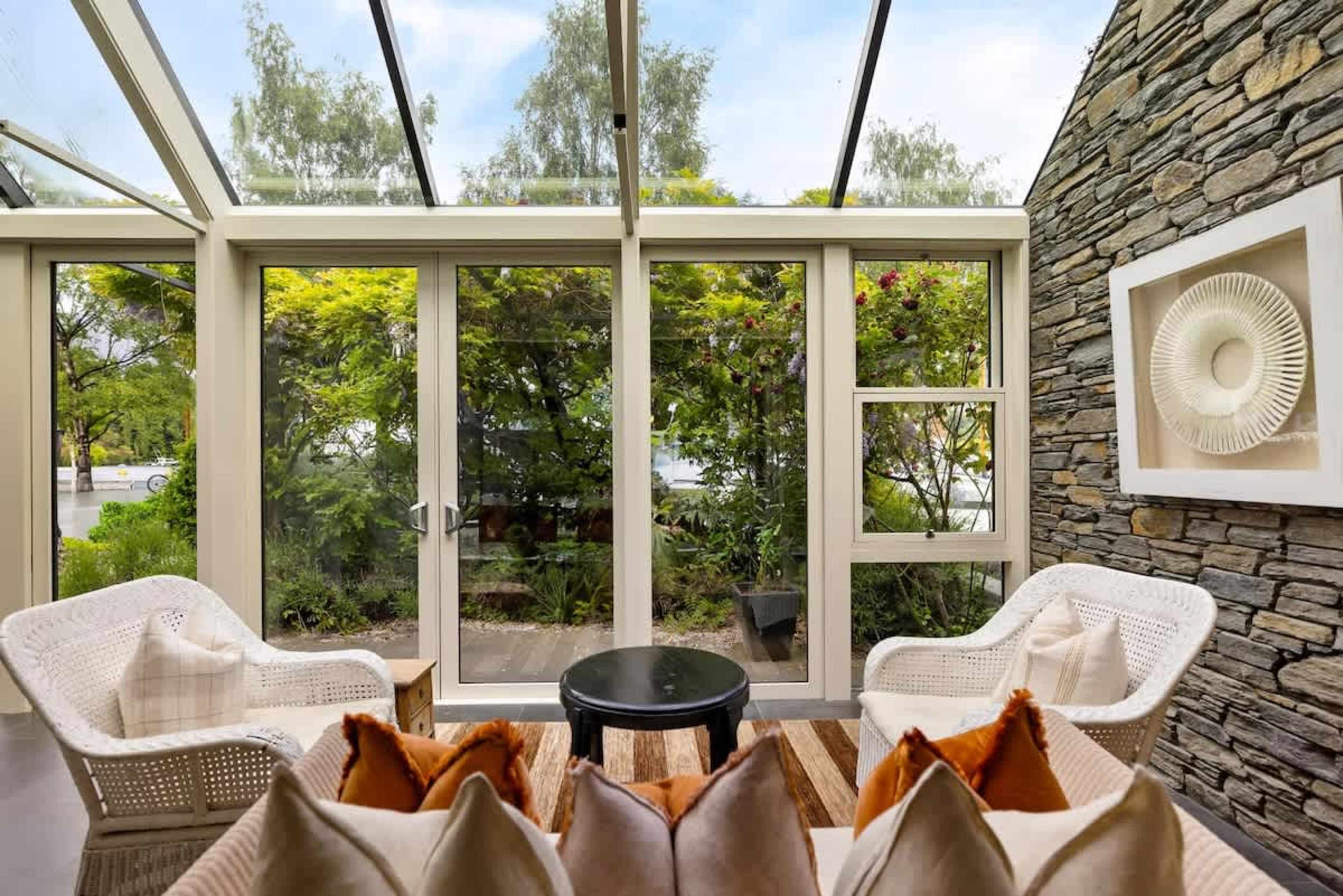 Breathtaking Views from the Conservatory – Relax in this sun-filled conservatory, offering stunning lake and mountain views—your perfect Queenstown retreat.