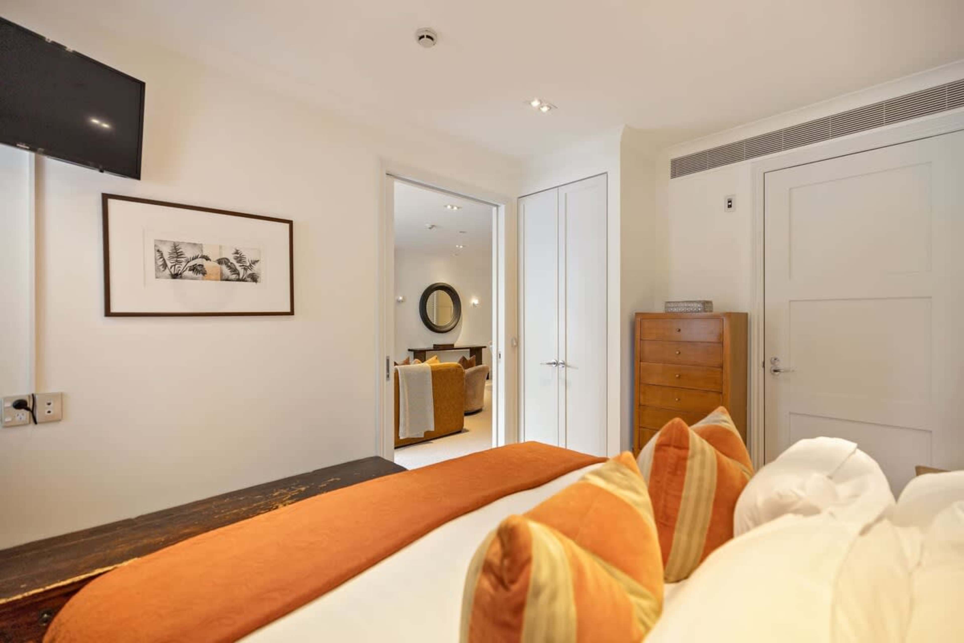Tranquil & Comfortable – The second bedroom offers a restful escape with a premium king bed, blackout blinds, and a peaceful ambiance.