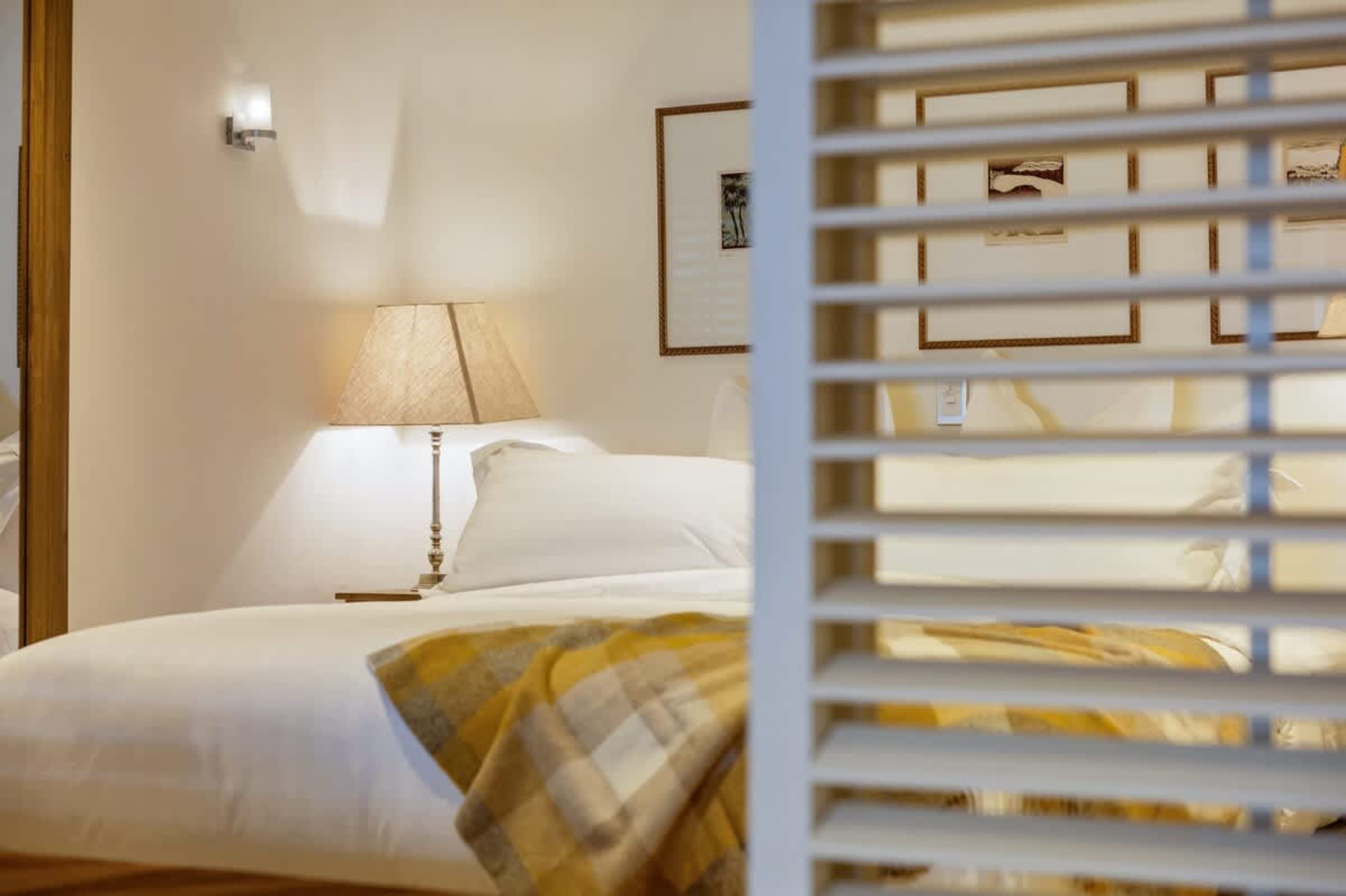 Sleep in Pure Comfort – Premium bedding, climate control, and blackout blinds ensure a restful night’s sleep in this stunning master suite.