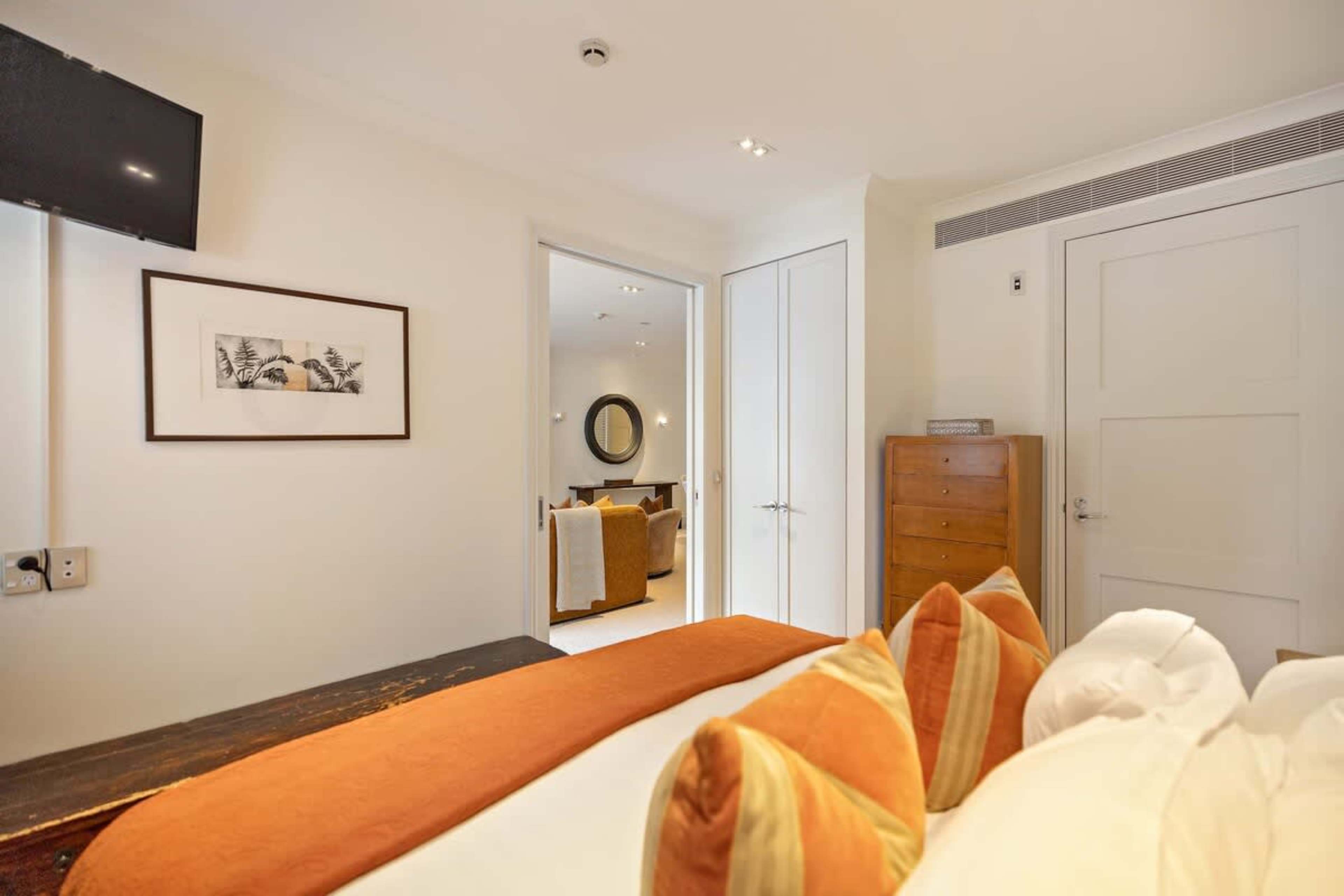 Tranquil & Comfortable – The second bedroom offers a restful escape with a premium king bed, blackout blinds, and a peaceful ambiance.