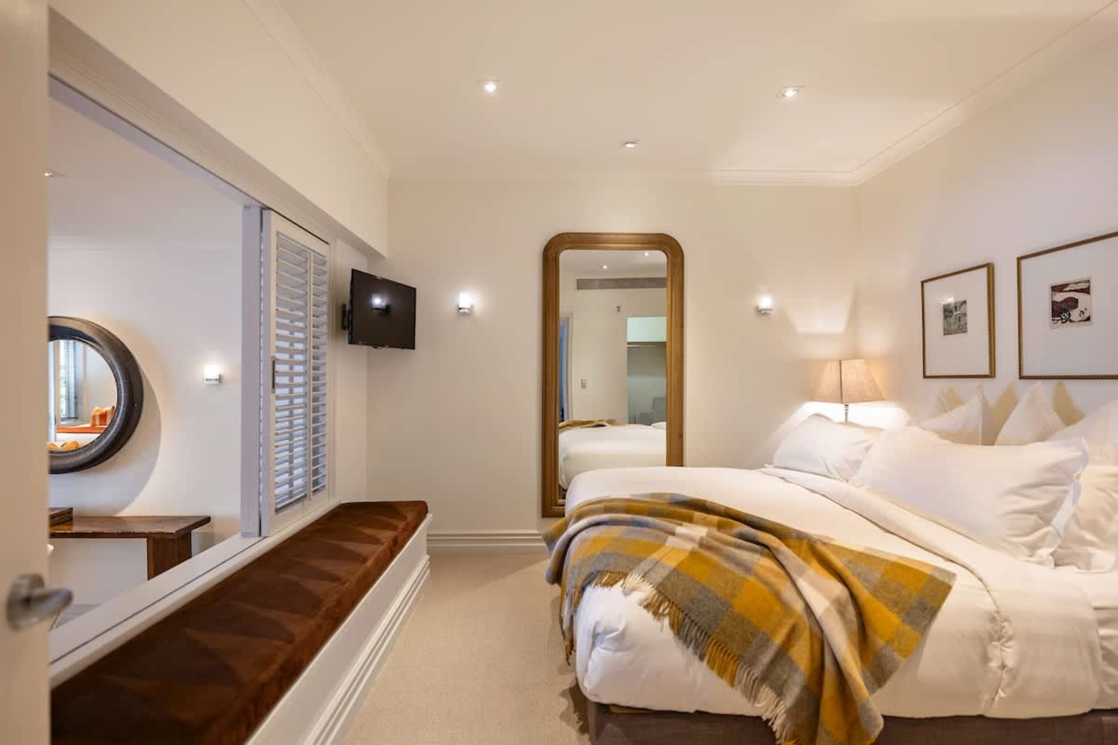 Luxurious Master Suite with King Bed – Rest easy in a brand-new king bed with luxe linen, blackout blinds, and air-conditioning for the perfect night’s sleep.