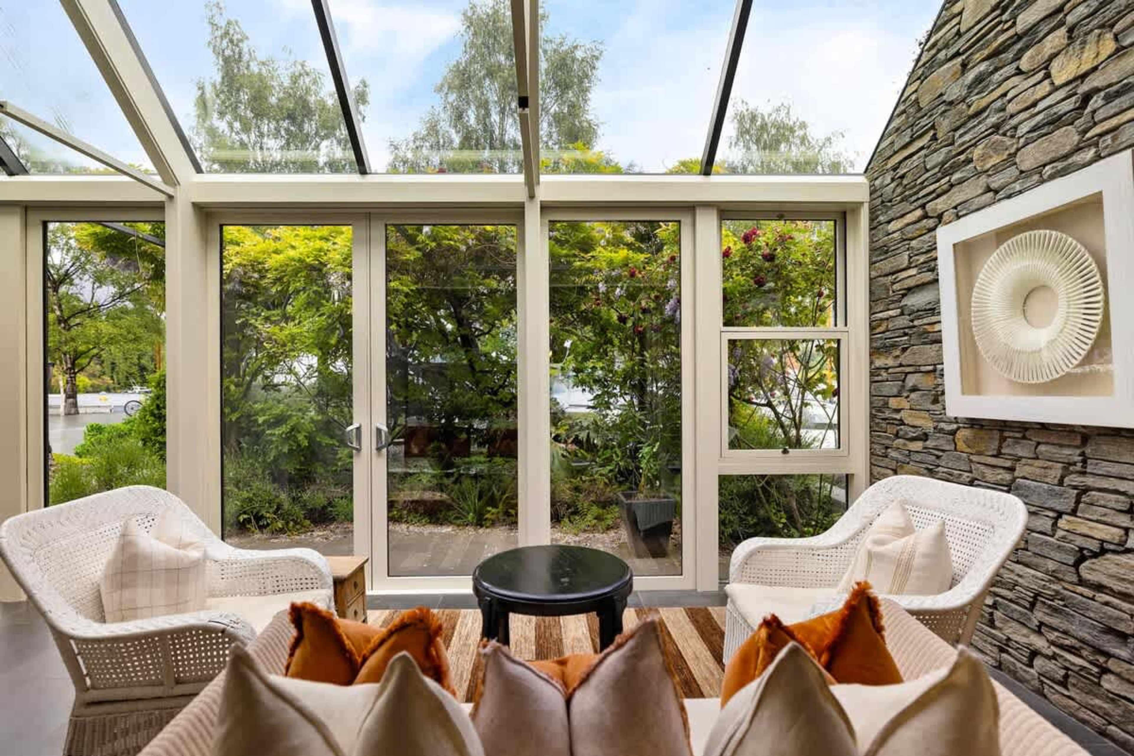 Breathtaking Views from the Conservatory – Relax in this sun-filled conservatory, offering stunning lake and mountain views—your perfect Queenstown retreat.