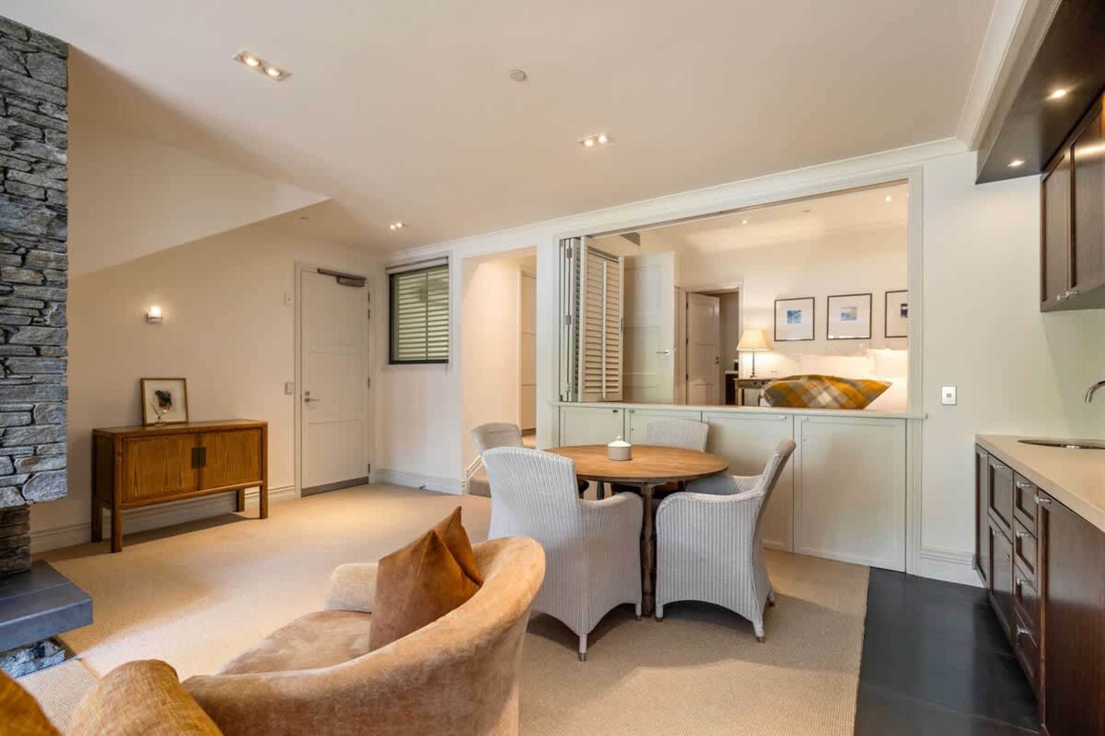 Elegant Dining Space for Four – This stylish dining area is perfect for enjoying meals with your loved ones. The open-plan layout offers seamless flow from the living room to your private patio for an al fresco dining experience.