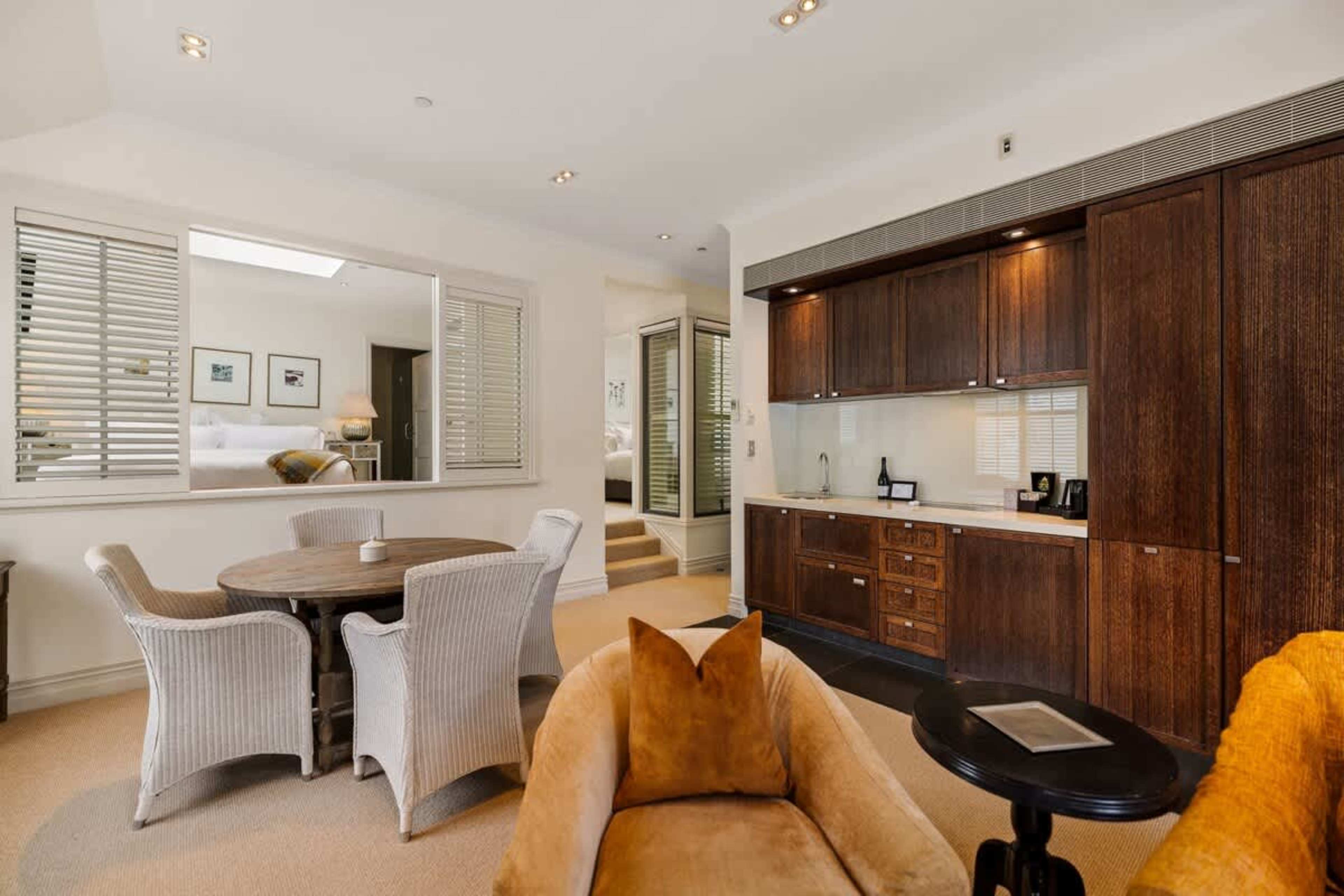 Fully Equipped for Culinary Adventures – This sleek kitchen features high-end appliances, Nespresso machine, and stylish finishes, perfect for preparing meals or enjoying a morning coffee before your Queenstown adventures.