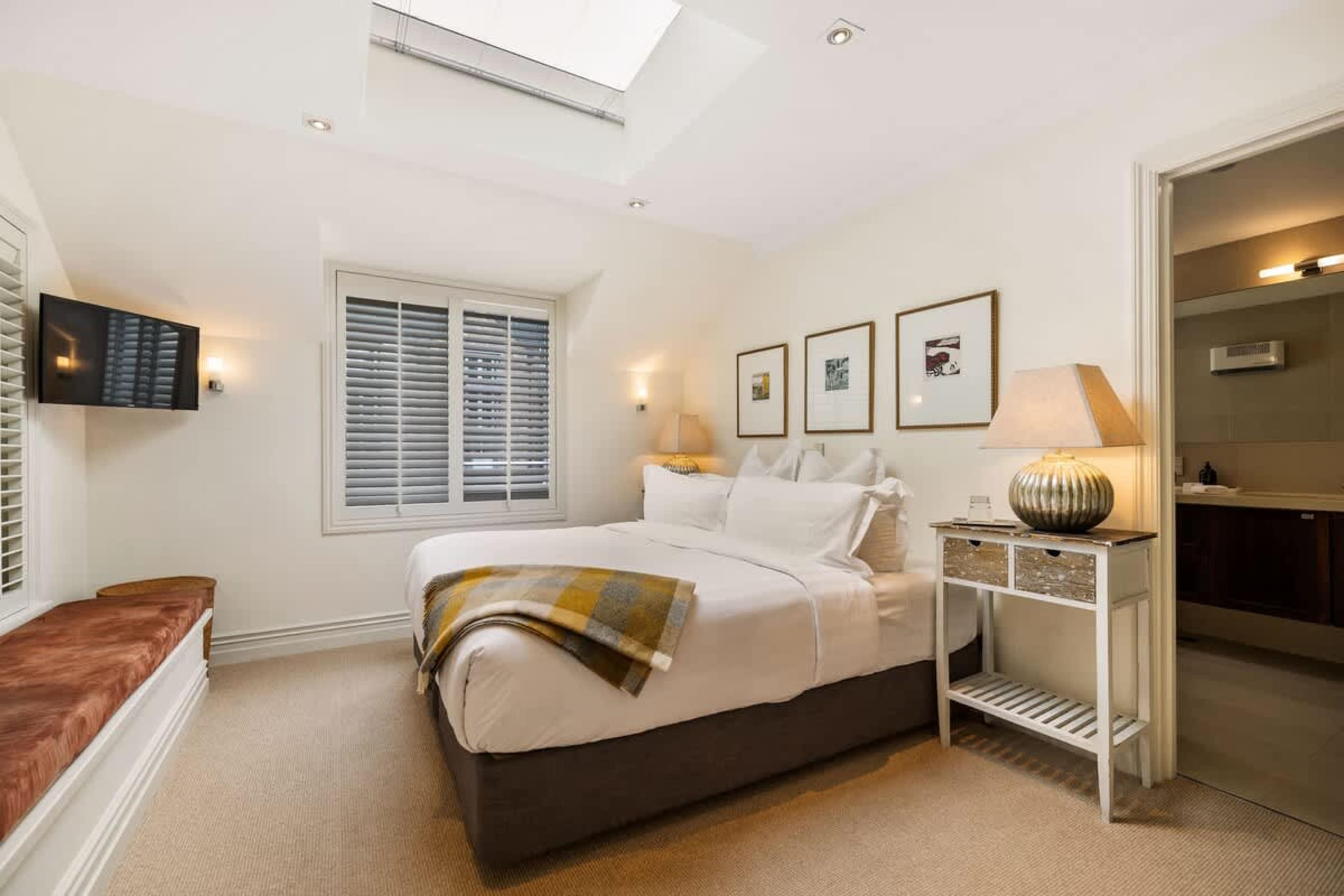 Luxury & Tranquility – Rest easy in the master bedroom, featuring a brand-new luxury bed, premium linen, blackout blinds, and complete silence, offering a restful night’s sleep in air-conditioned comfort.
