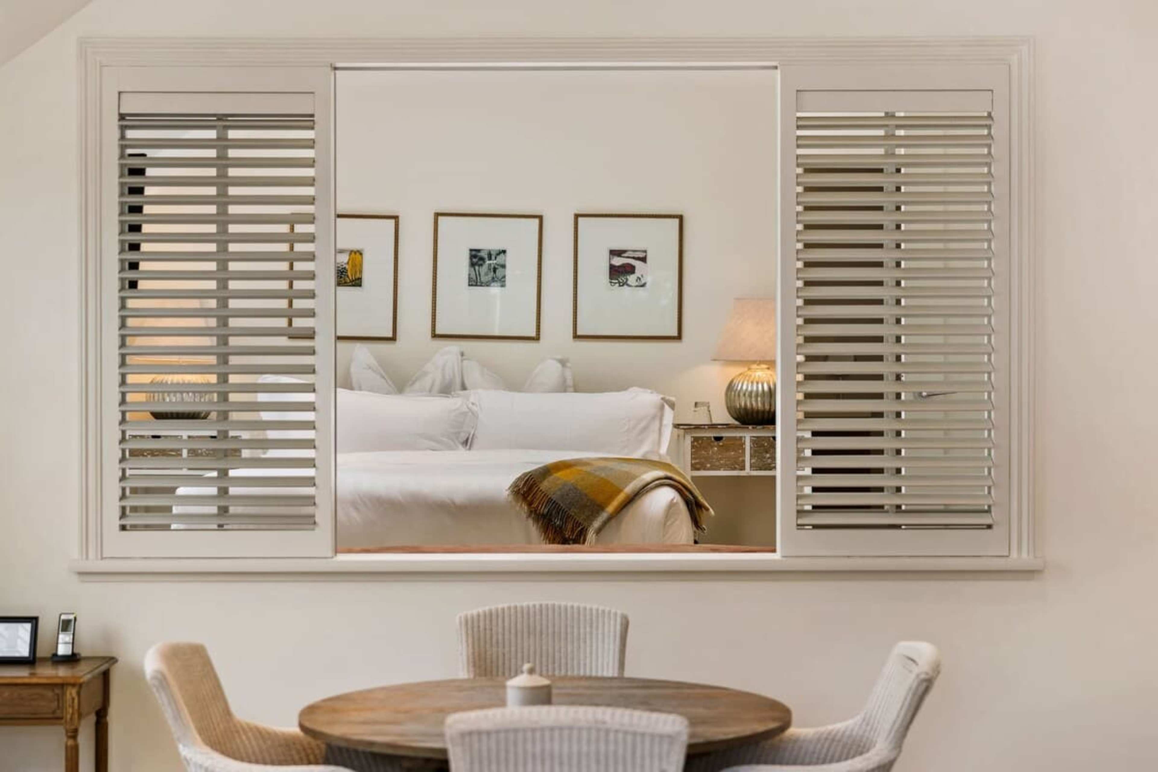 Elegant Comfort in Queenstown – With a brand-new bed, luxe linen, blackout blinds, and an ensuite, this peaceful master suite offers complete privacy and comfort, plus air-conditioning for year-round relaxation.