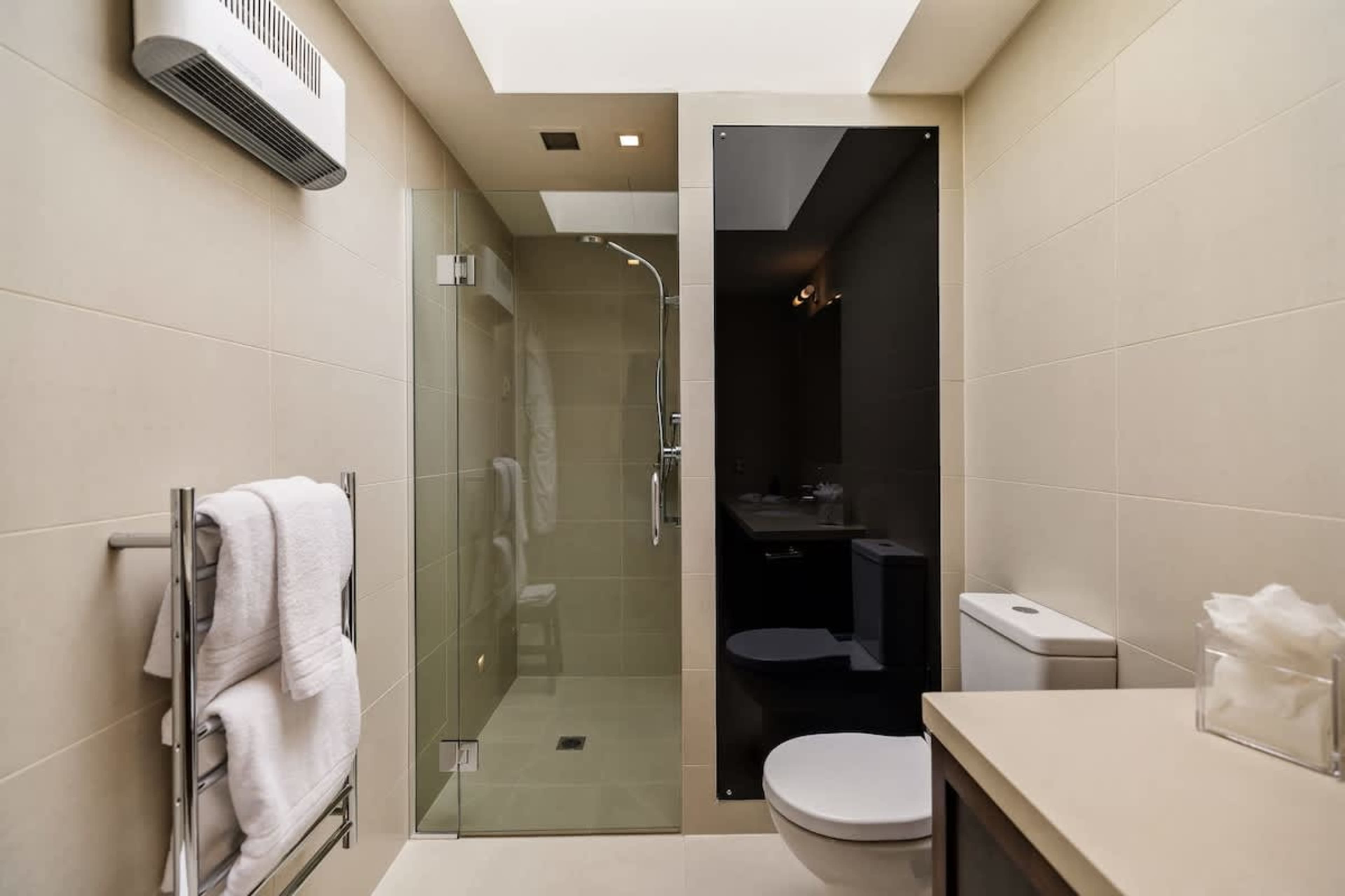 Luxury Ensuite for Bedroom 3 – Complete with bathrobes, slippers, and premium amenities, this stylish ensuite provides a tranquil and indulgent retreat.