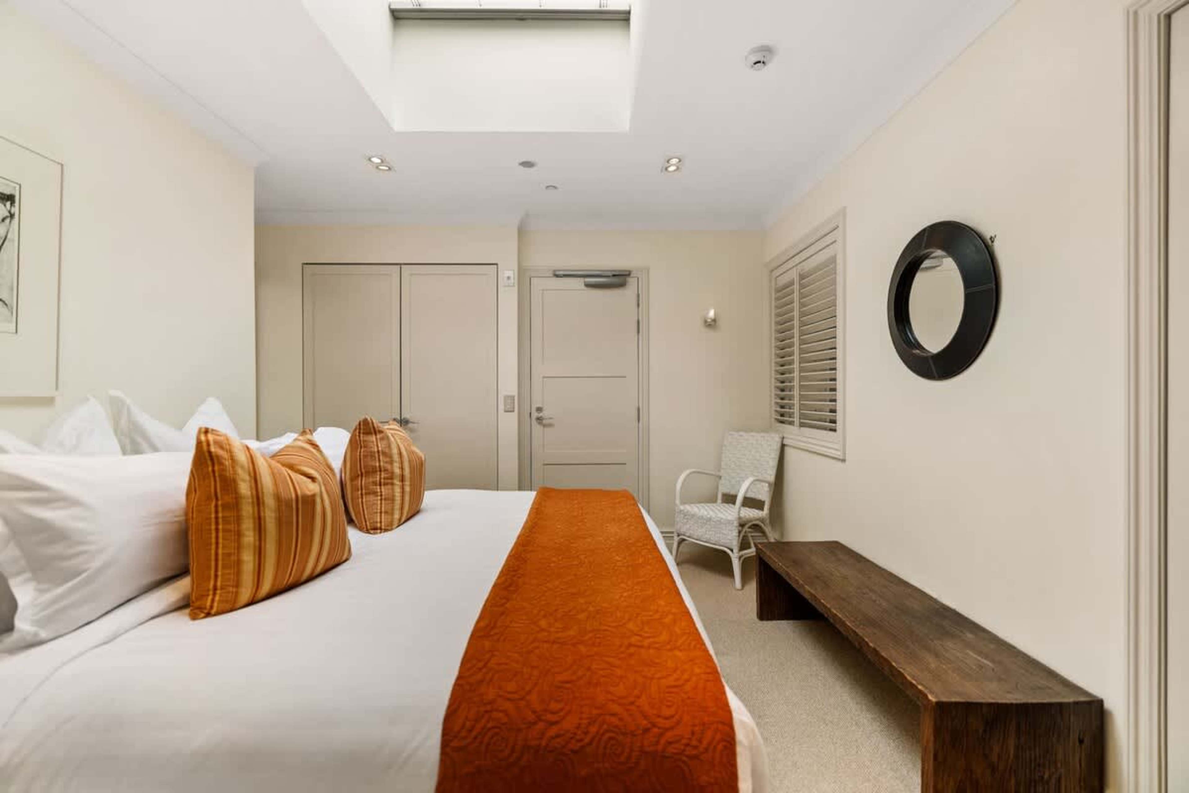 Ultimate Comfort & Privacy – Sleep soundly in this beautifully appointed third bedroom, featuring a king bed, blackout blinds, and a serene atmosphere for complete tranquility.