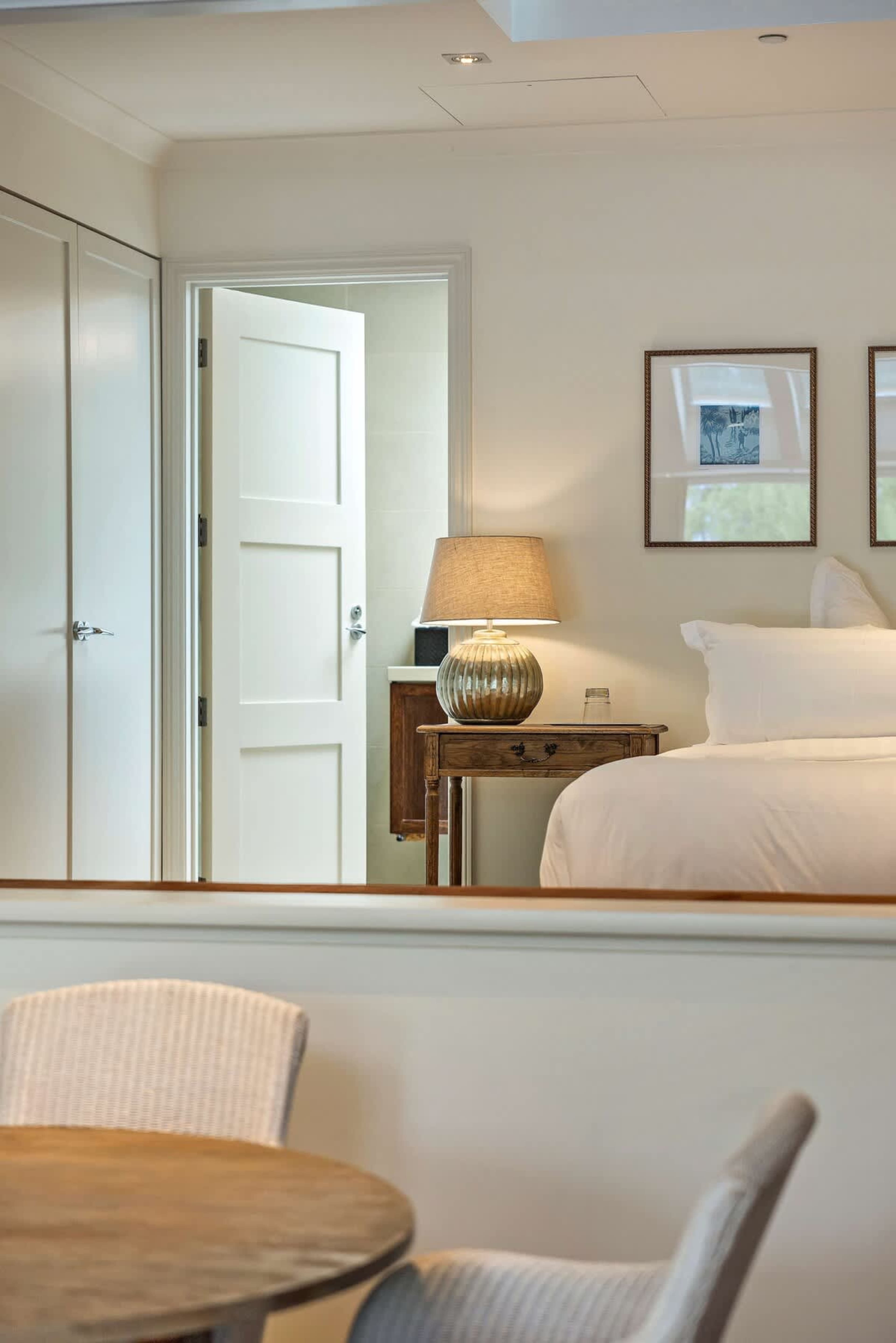 Sleep in Pure Comfort – Premium bedding, air-conditioning, and blackout blinds guarantee a restful night in this beautifully designed bedroom.