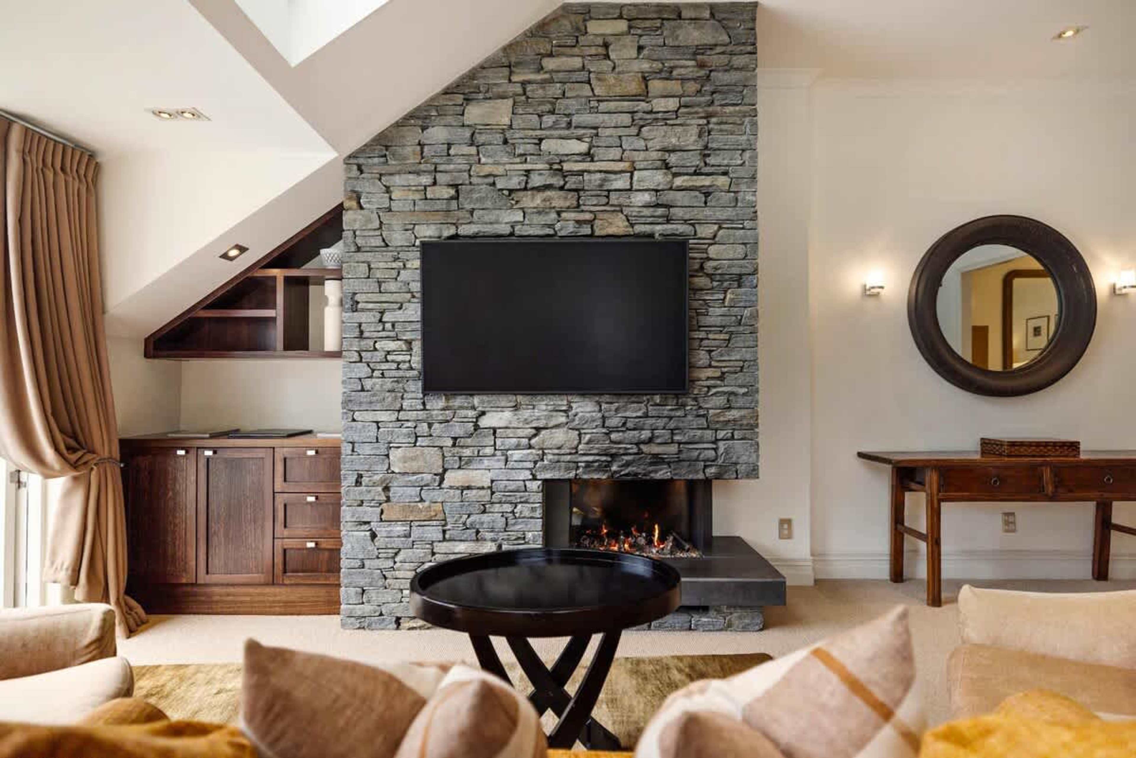 Bright & Airy with Stunning Scenery – The spacious lounge is bathed in natural light, leading to a private balcony where you can soak in lake and mountain views.