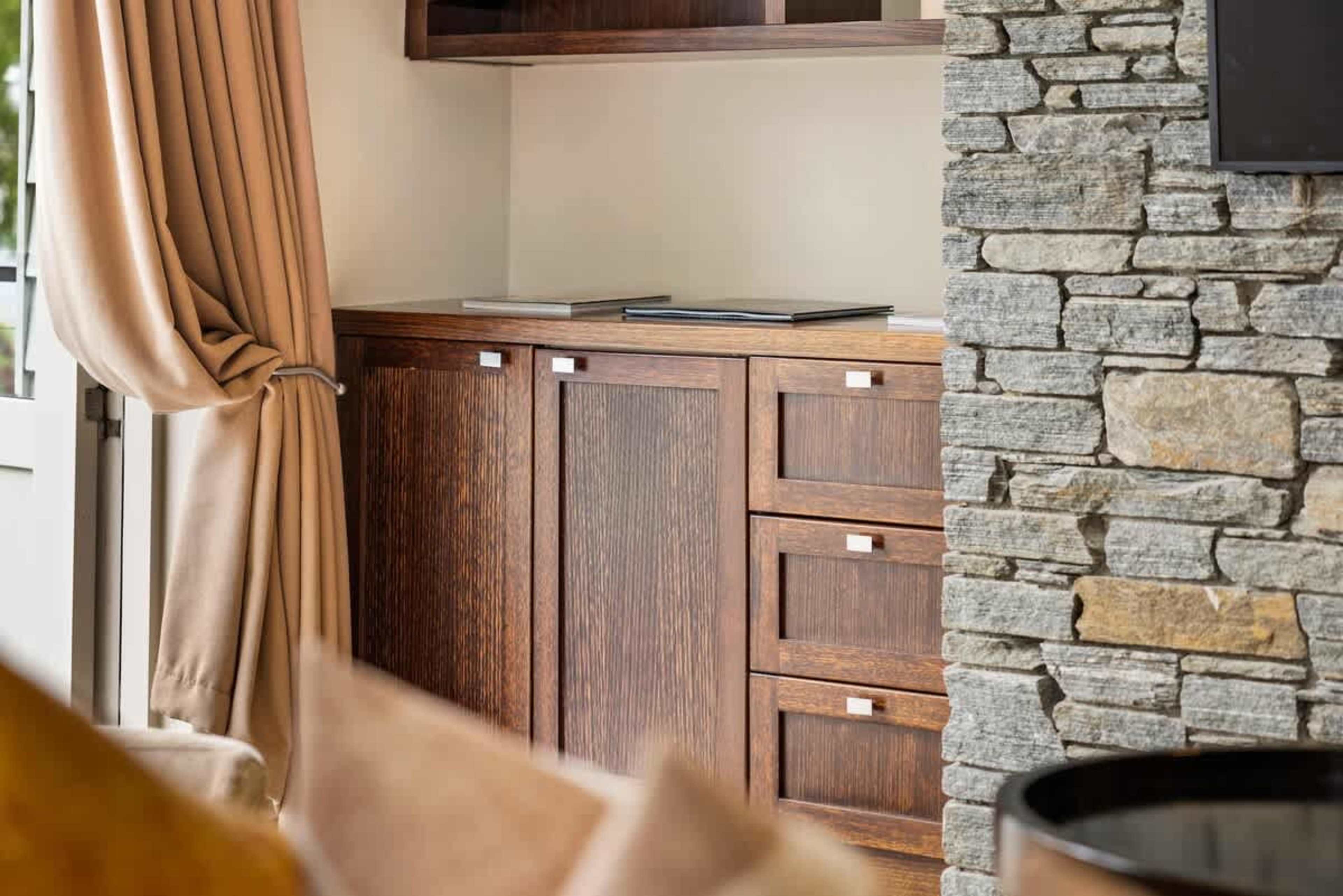 Relax in the Lap of Luxury – Whether you want to relax by the gas fireplace or enjoy the stunning views from your private balcony, this living room is the ideal place to unwind.