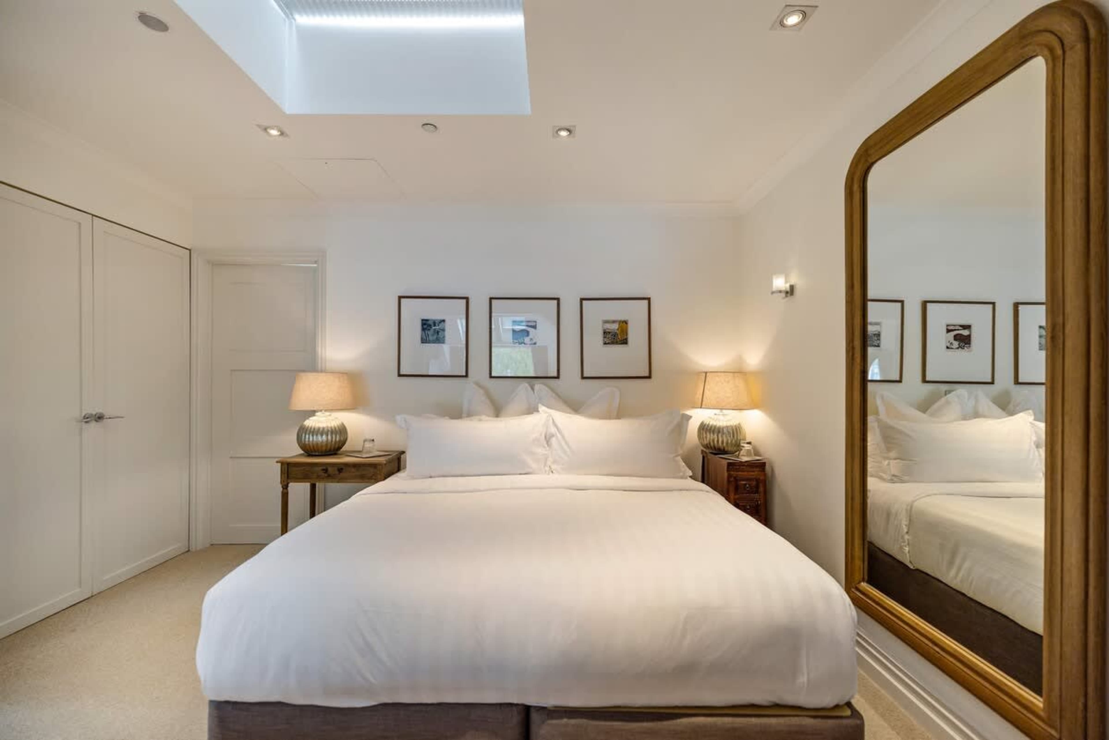 A Tranquil Retreat – This master bedroom offers ultimate comfort, featuring a king-size bed, plush bedding, and a peaceful ambiance for restful nights.