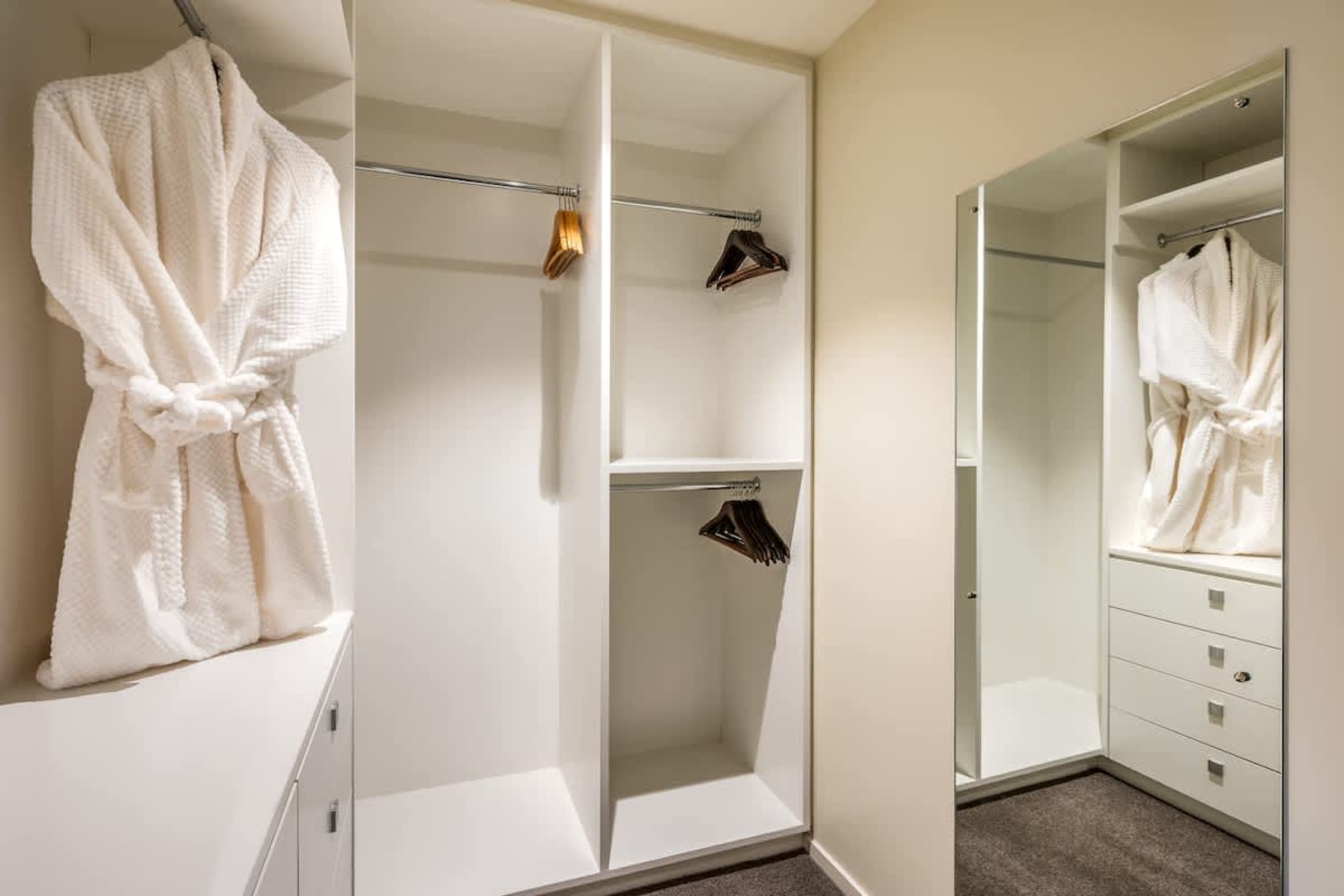 The second bedroom includes a spacious walk-in wardrobe with plenty of storage for your belongings. It offers a clutter-free, organized space to enhance your Queenstown stay.