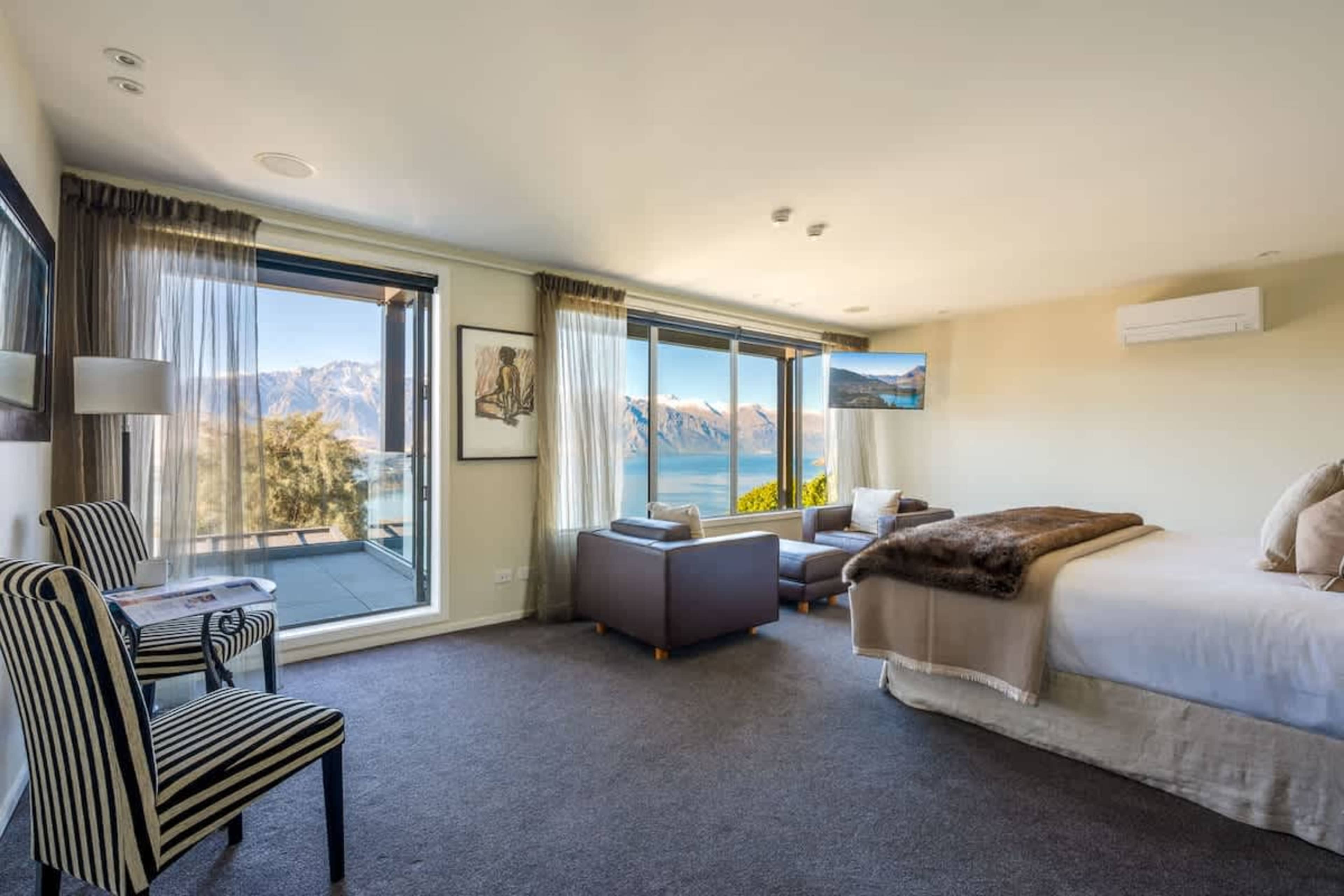 Relax in the elegant master suite designed for comfort and style, with plush linens and ambient lighting. The ensuite includes a walk-in shower and premium amenities for a hotel-quality experience.