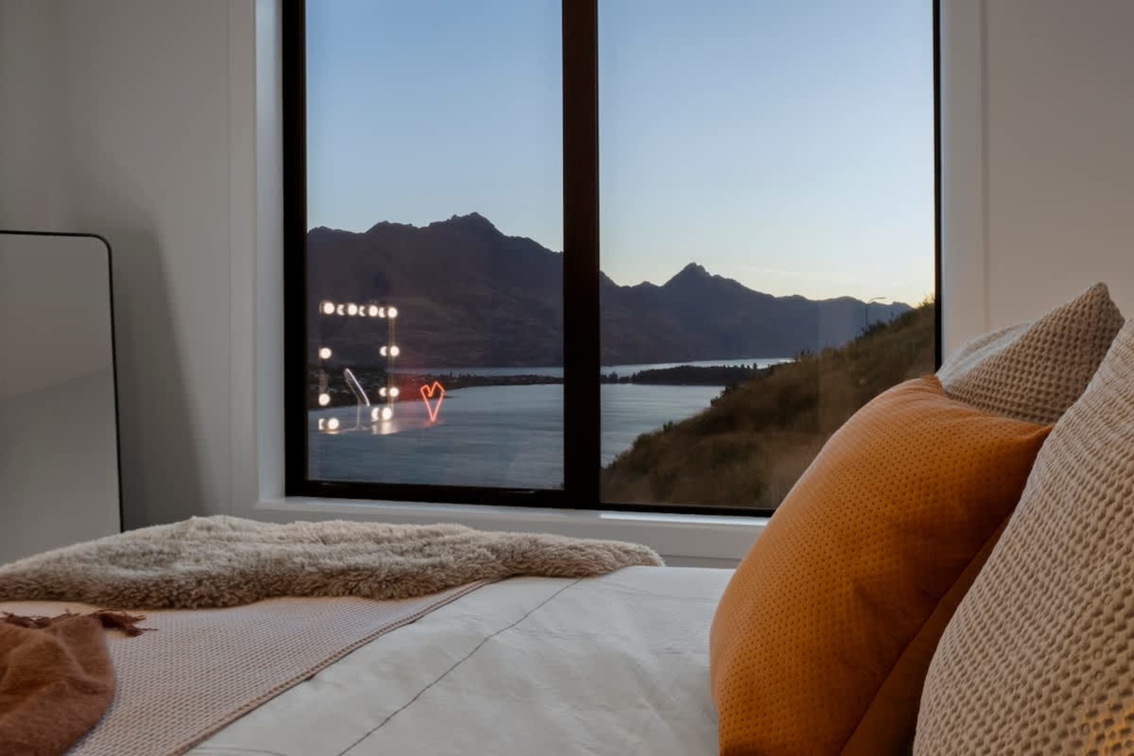 Wake up in the second bedroom to soft light and calming lake views. Built-in storage keeps your space clear and restful.