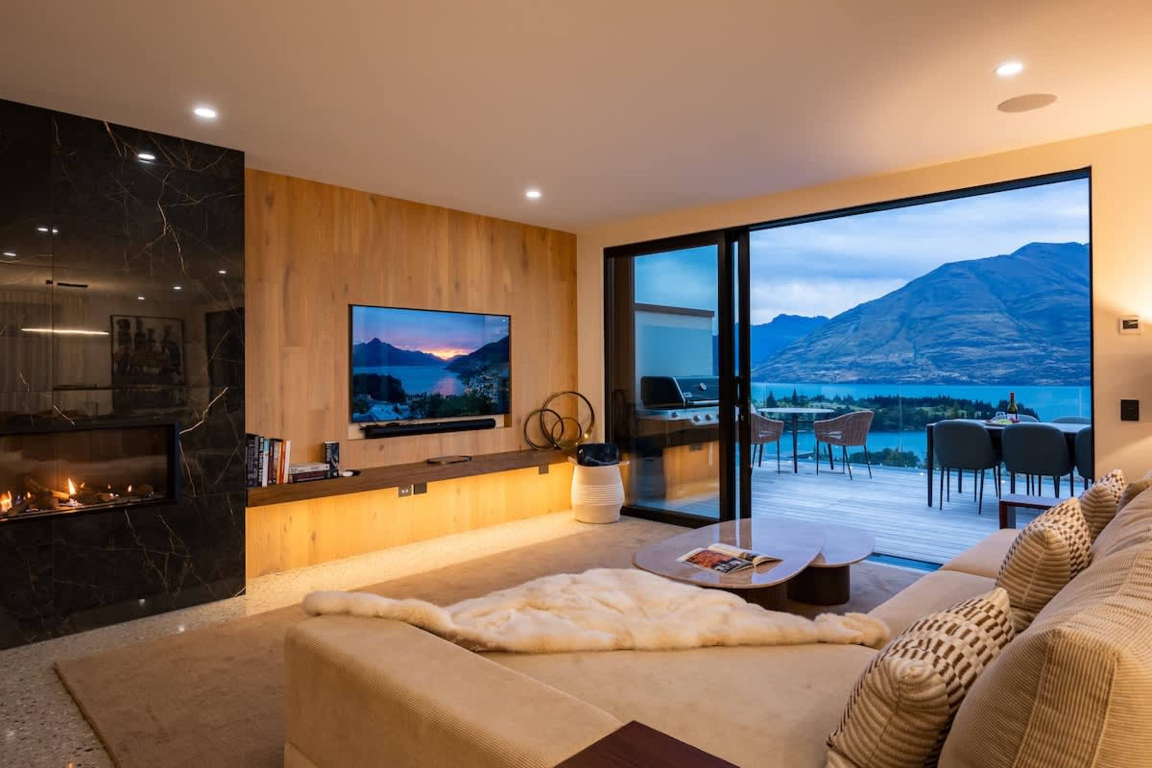 Designer fireplace feature
Gather around the sleek fireplace on cooler evenings. Its modern design adds both warmth and a focal point to the room.
