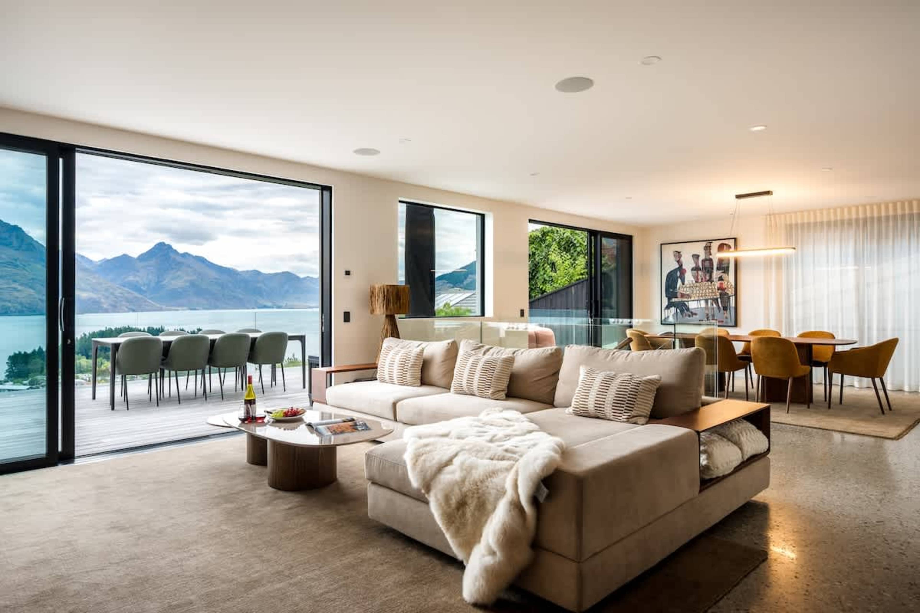 Step into a bright, open-plan living area designed for both relaxation and entertaining. Every corner is carefully curated with luxury furnishings and thoughtful design.