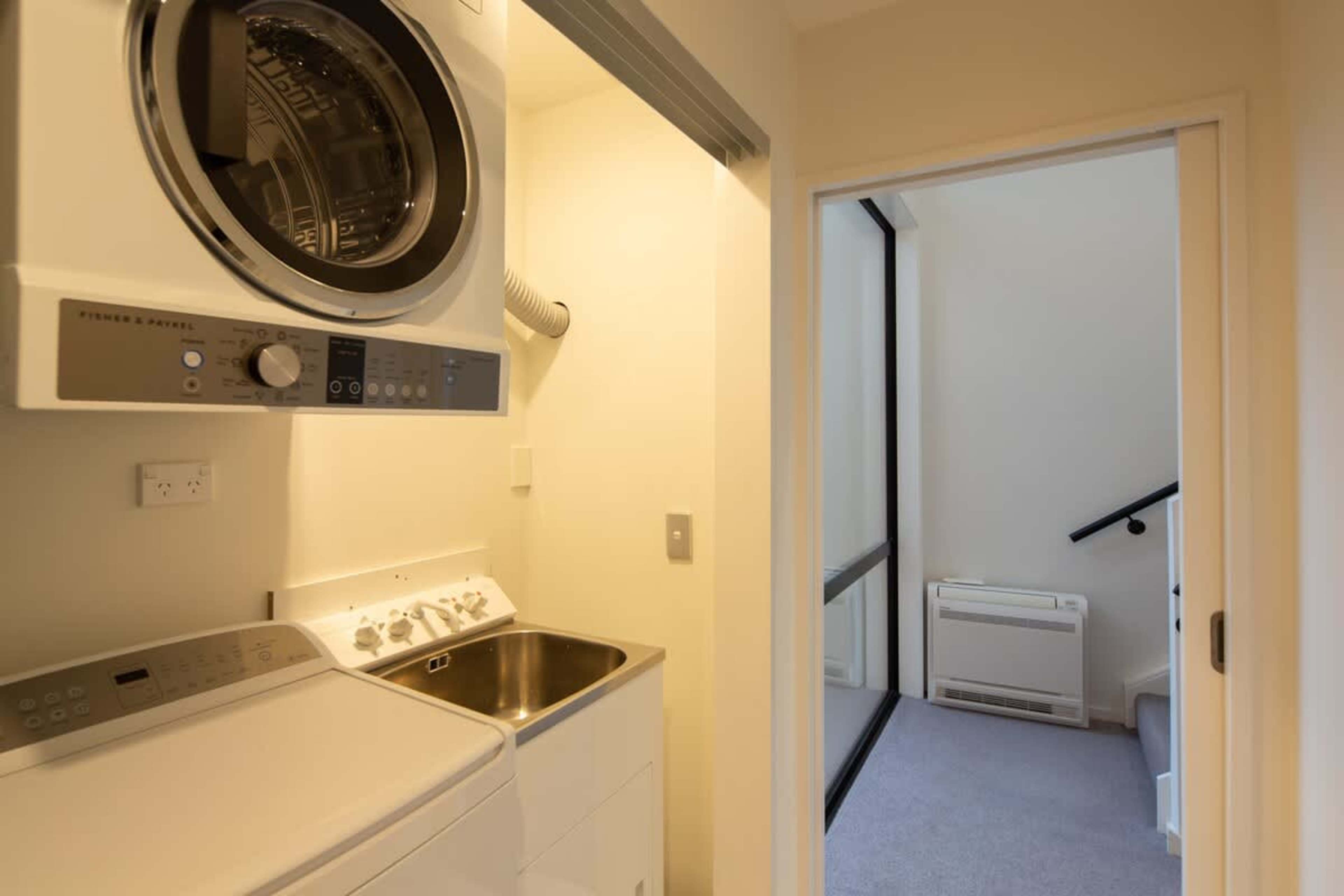 
Convenient and Fully Equipped Laundry
This modern laundry features a washer, dryer, and ample space for all your needs. Perfect for longer stays, it offers everything you need to keep your clothes fresh while enjoying your time in Queenstown.