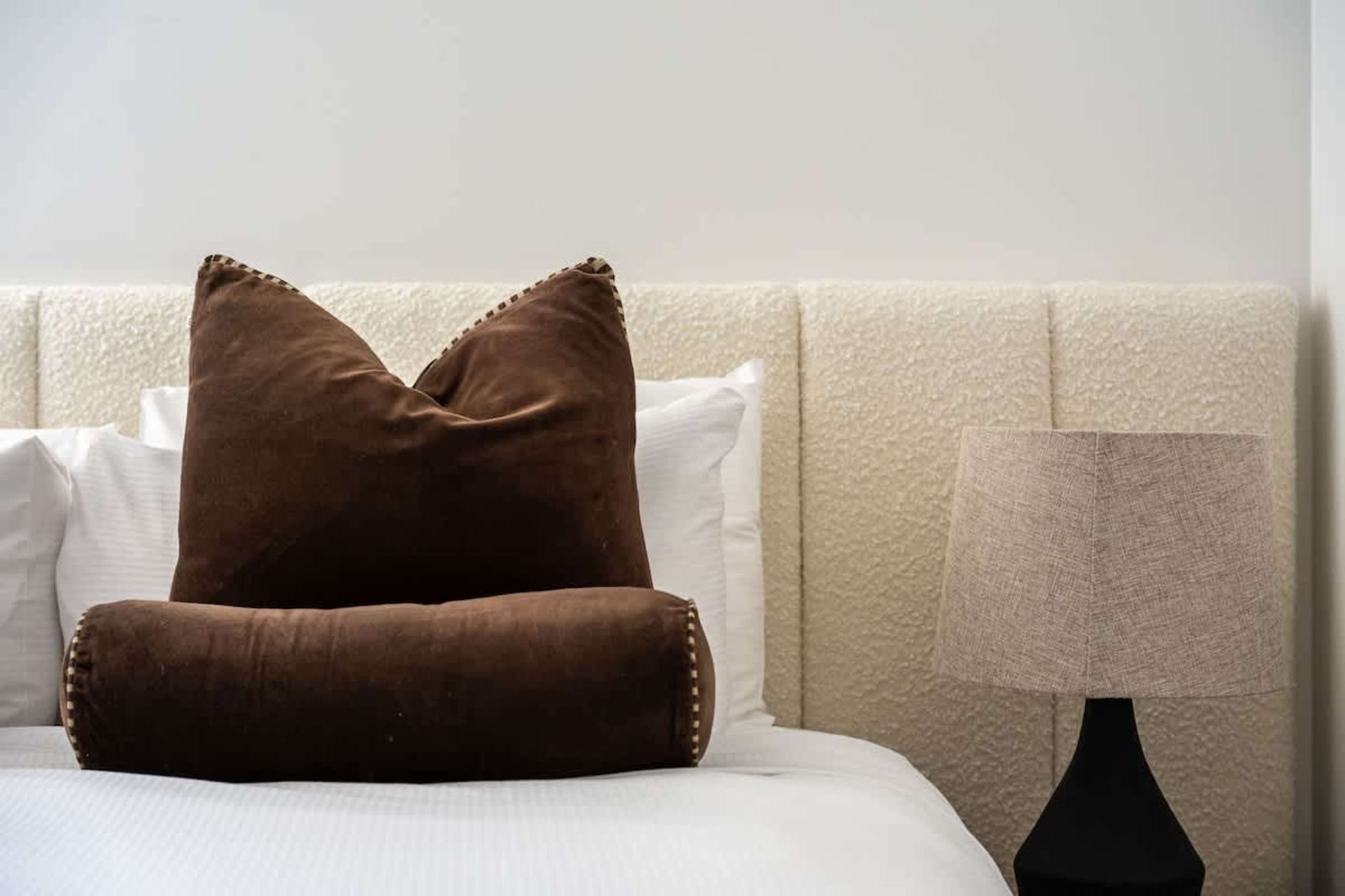Bedroom 2, Clubhouse apartments Jacks Point Golf Course. Brand new Sleepyhead king bed, sumptuous luxury bedding and pillows, stylish alpine interiors. Ideal golf & ski getaway.