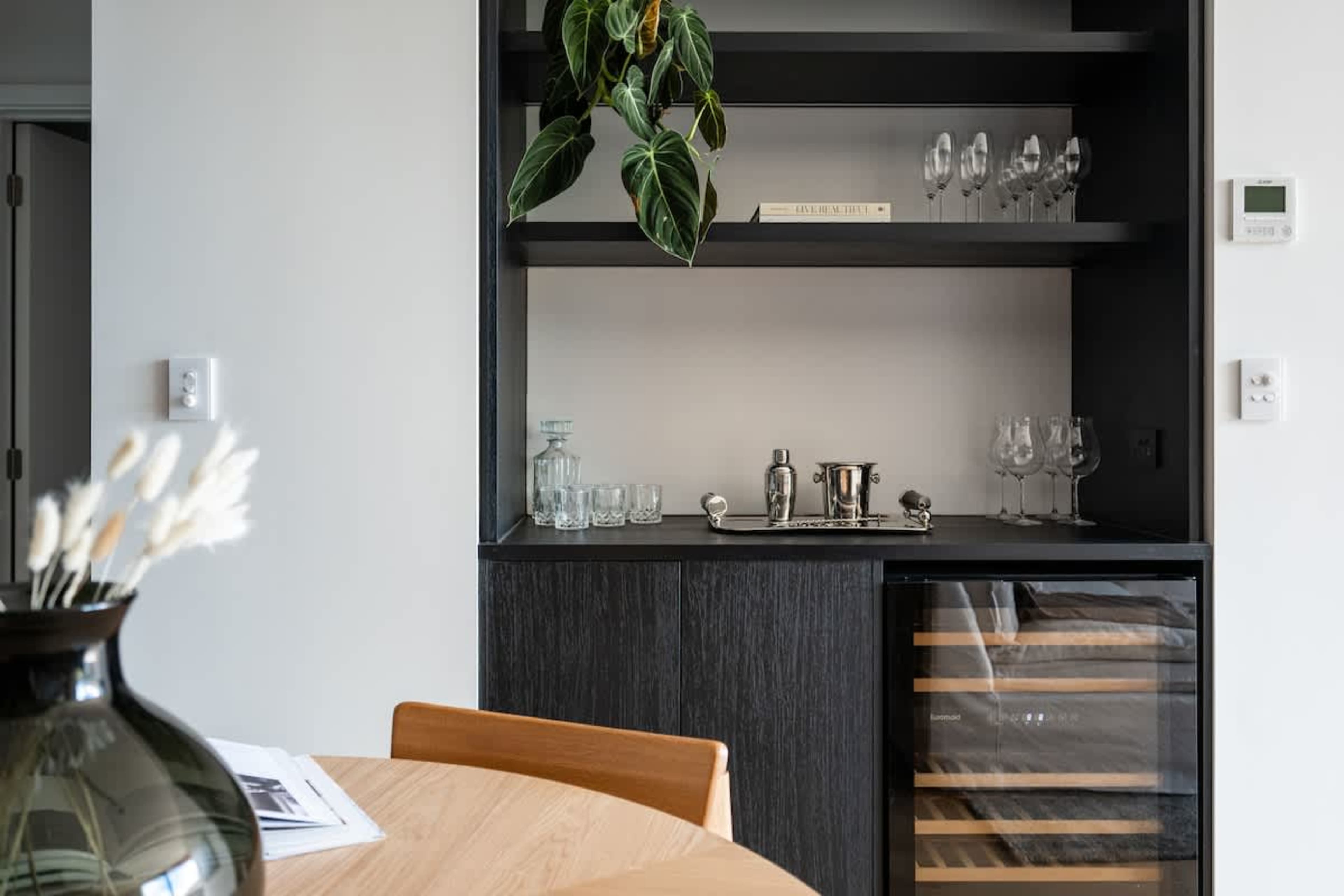 Fully equipped kitchen, Clubhouse Lane at Jacks Point Golf Course. Modern design, stone surfaces, quality appliances, panoramic Remarkables views. Ideal ski golf retreat.