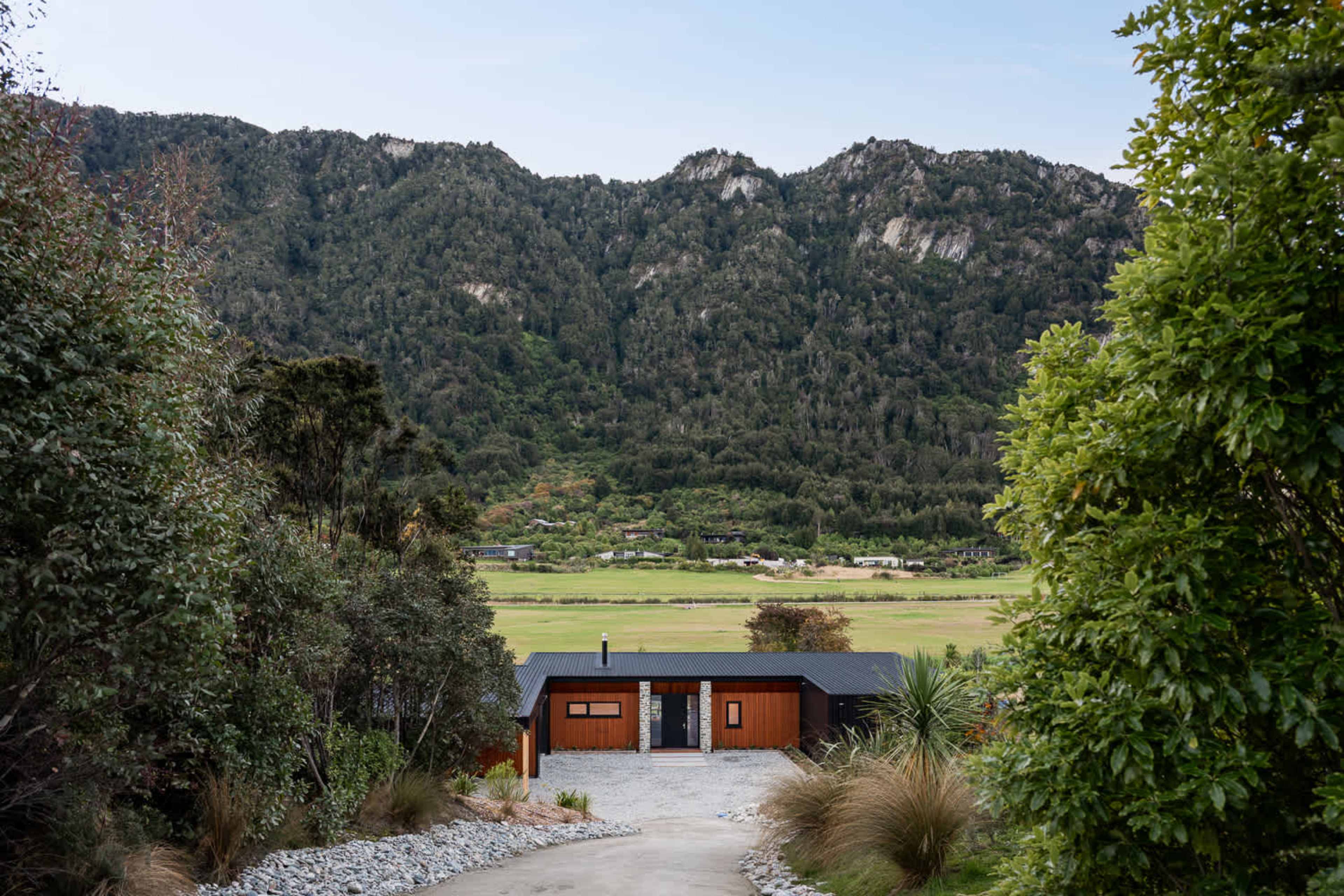 Front of the property and the mountainous surrounds