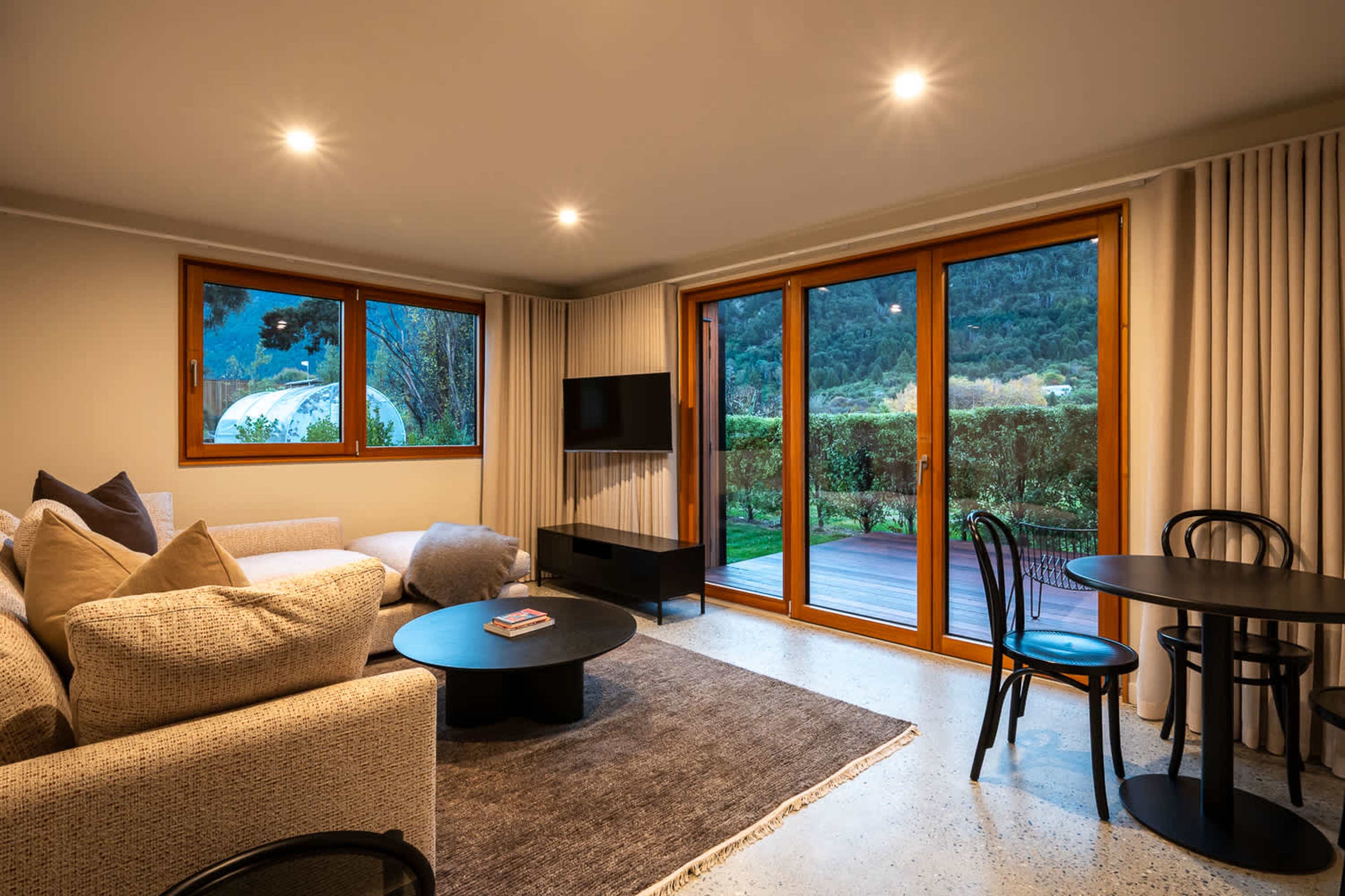 Self-contained unit - Living room at dusk