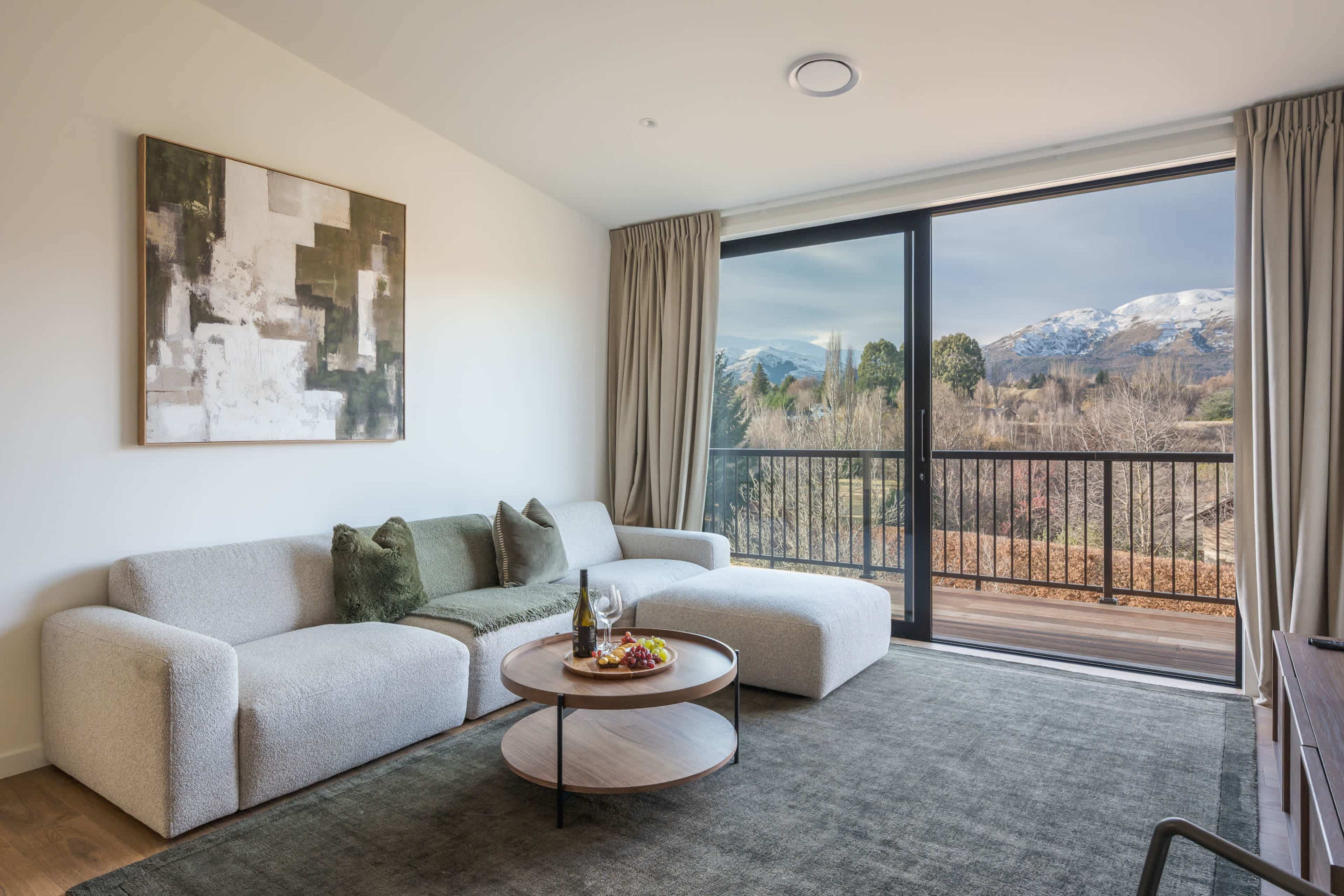 Sink into the plush sofa and soak up sweeping, uninterrupted mountain views.