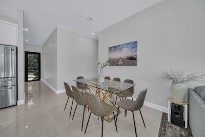 Dinning table for 10, 2 additional chairs are in the rooms