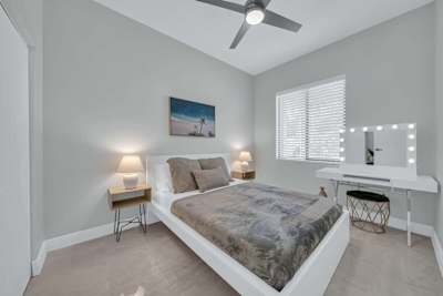 Third bedroom with queen tempur pedic bed and vanity