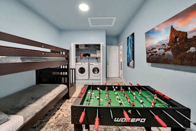 With 55' TV and foosbal