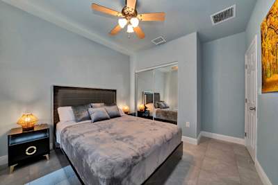 With queen size bed and TV