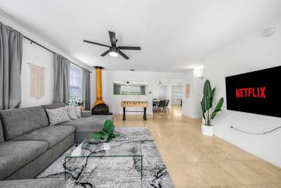 Open living room with 70" Smart TV