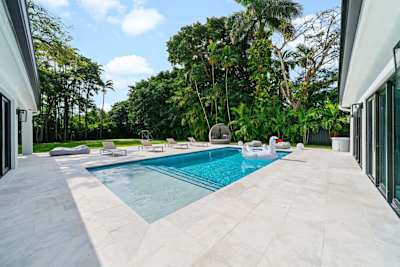 Pool Area with loungers and giant swan