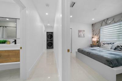 Hallway view of guest bedroom and bathroom