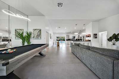 Dedicated spaces for games, comfortable living, and memorable meals.