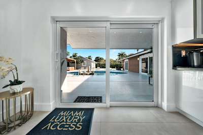 Seamless indoor-outdoor living with direct pool access.
