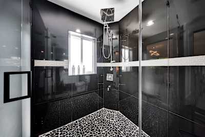 Indulge in a spa-like experience with this premium walk-in shower.